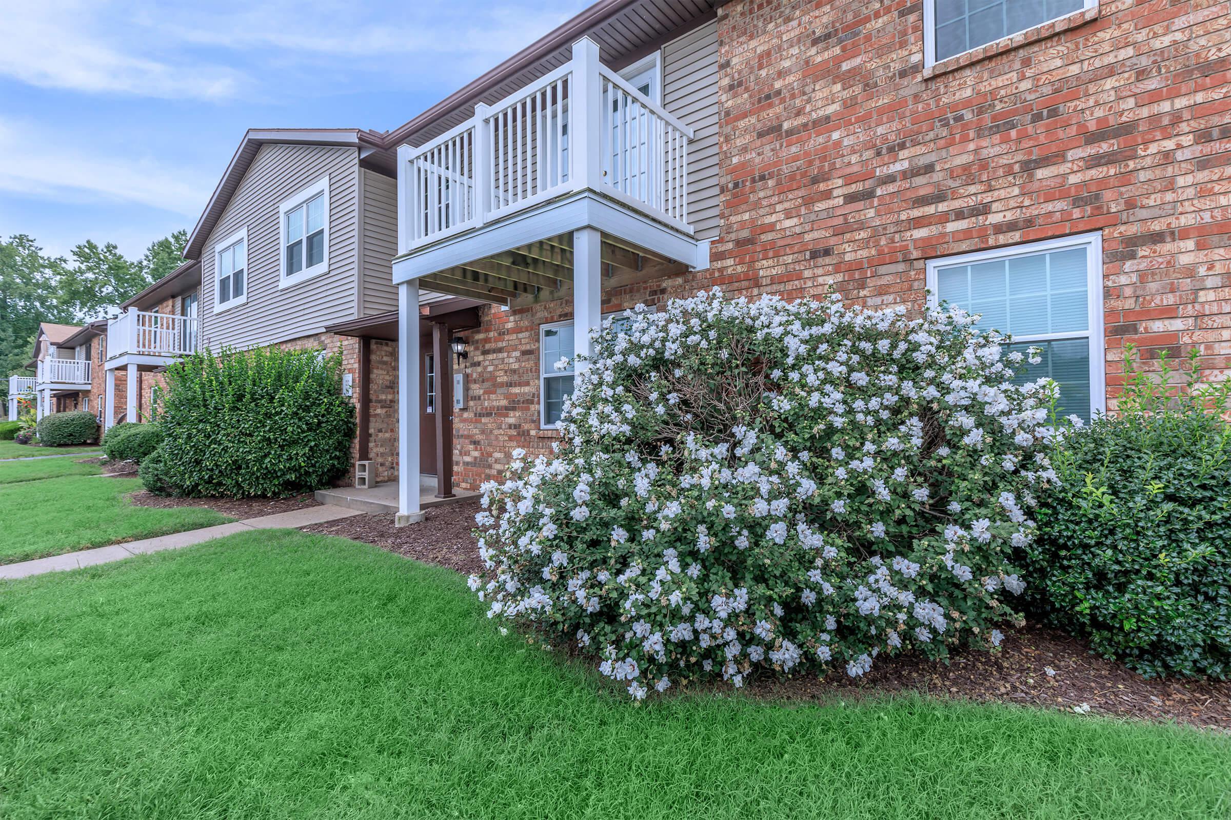 BEAUTIFUL LANDSCAPING OUTSIDE TERRA TRACE APARTMENT HOMES FOR RENT