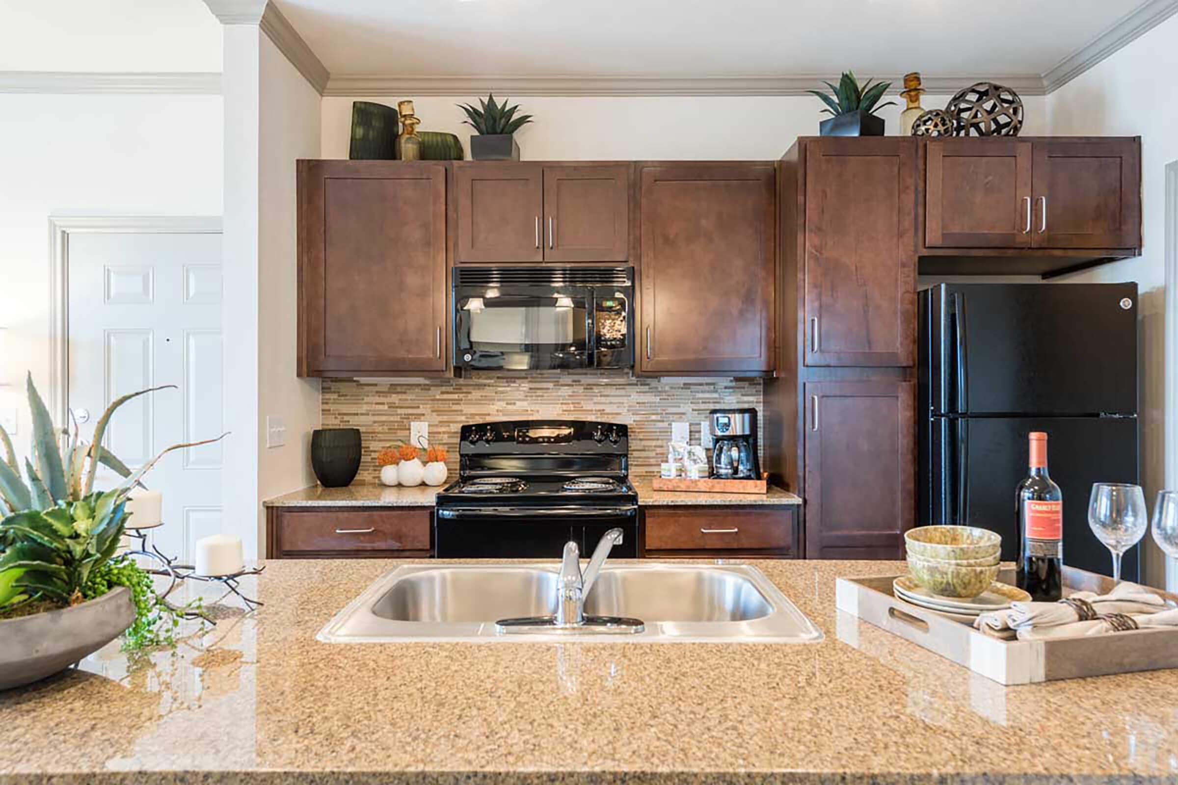 a modern kitchen with stainless steel appliances