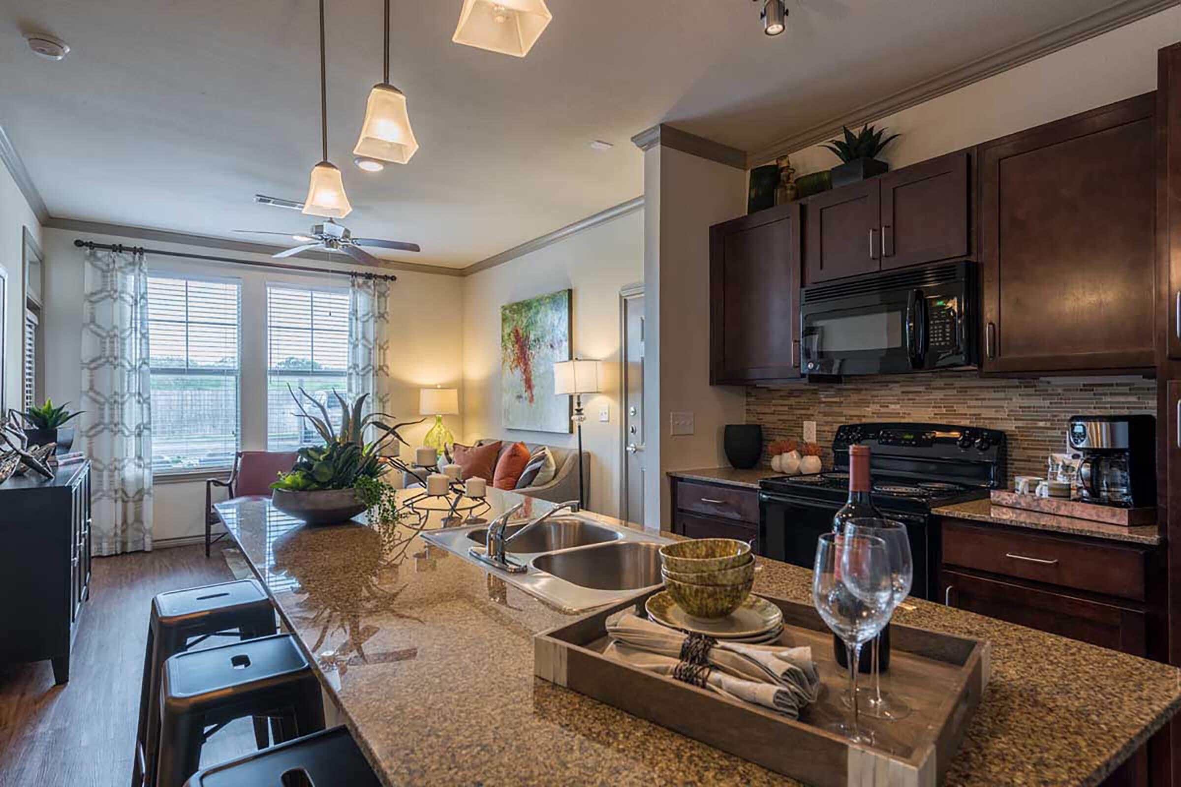 a living room filled with furniture and a fireplace