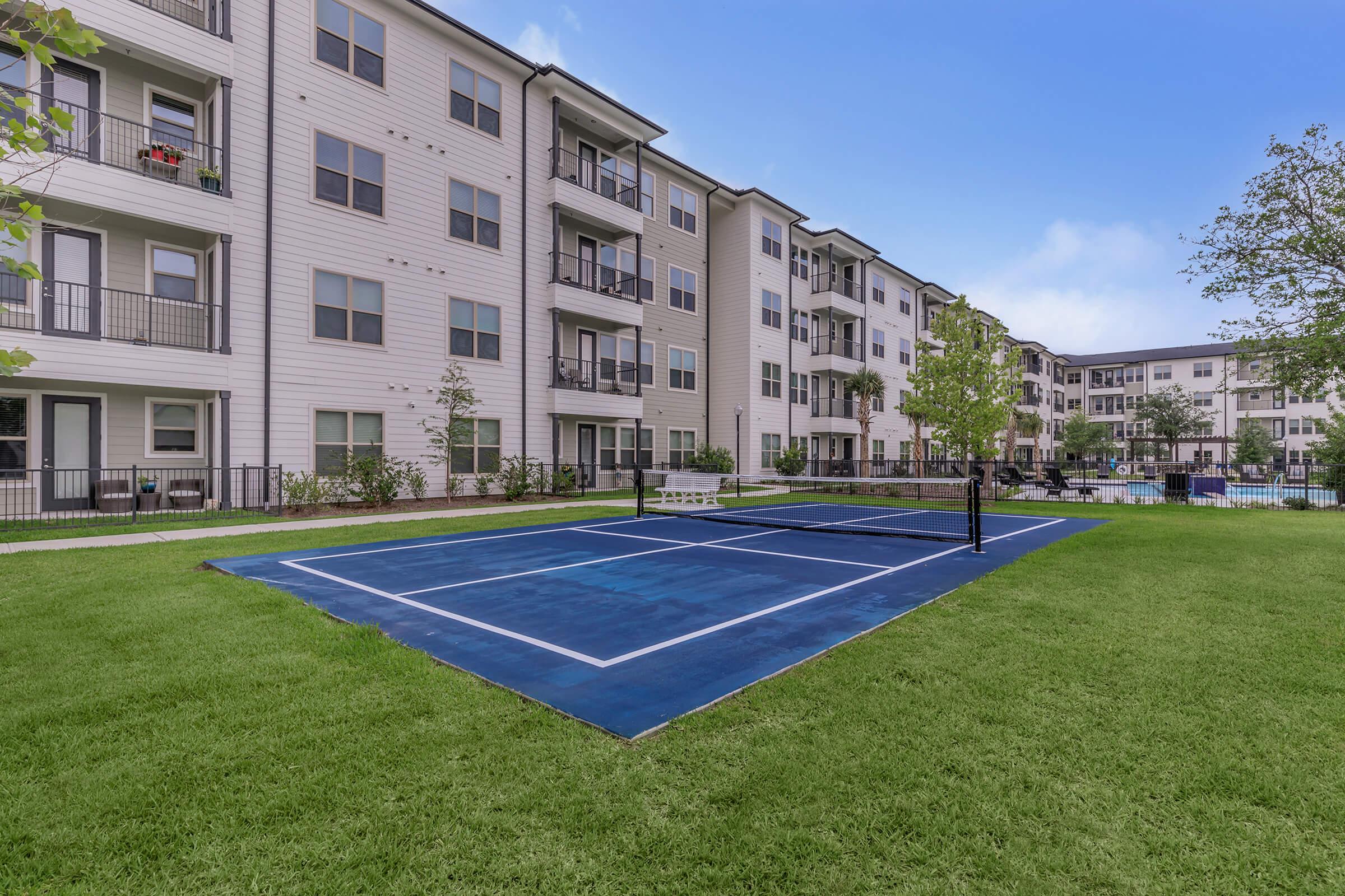 a large lawn in front of a building