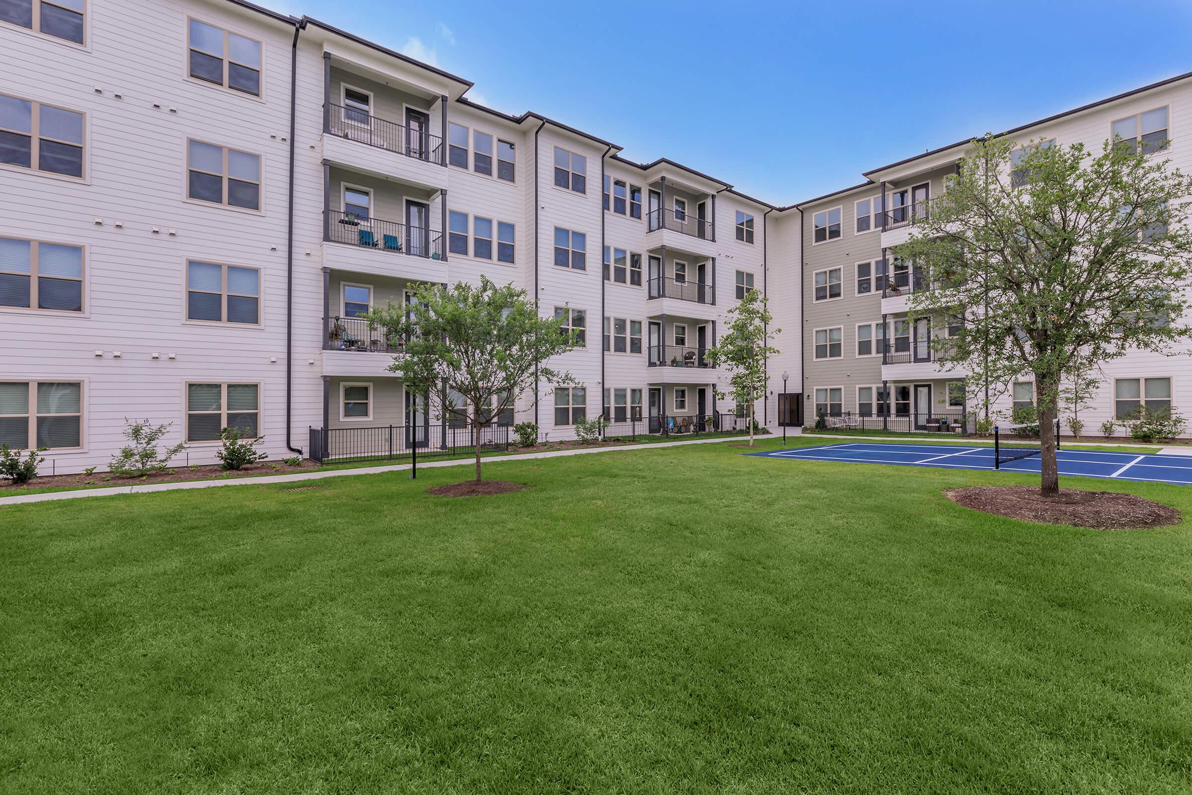 a large lawn in front of a building