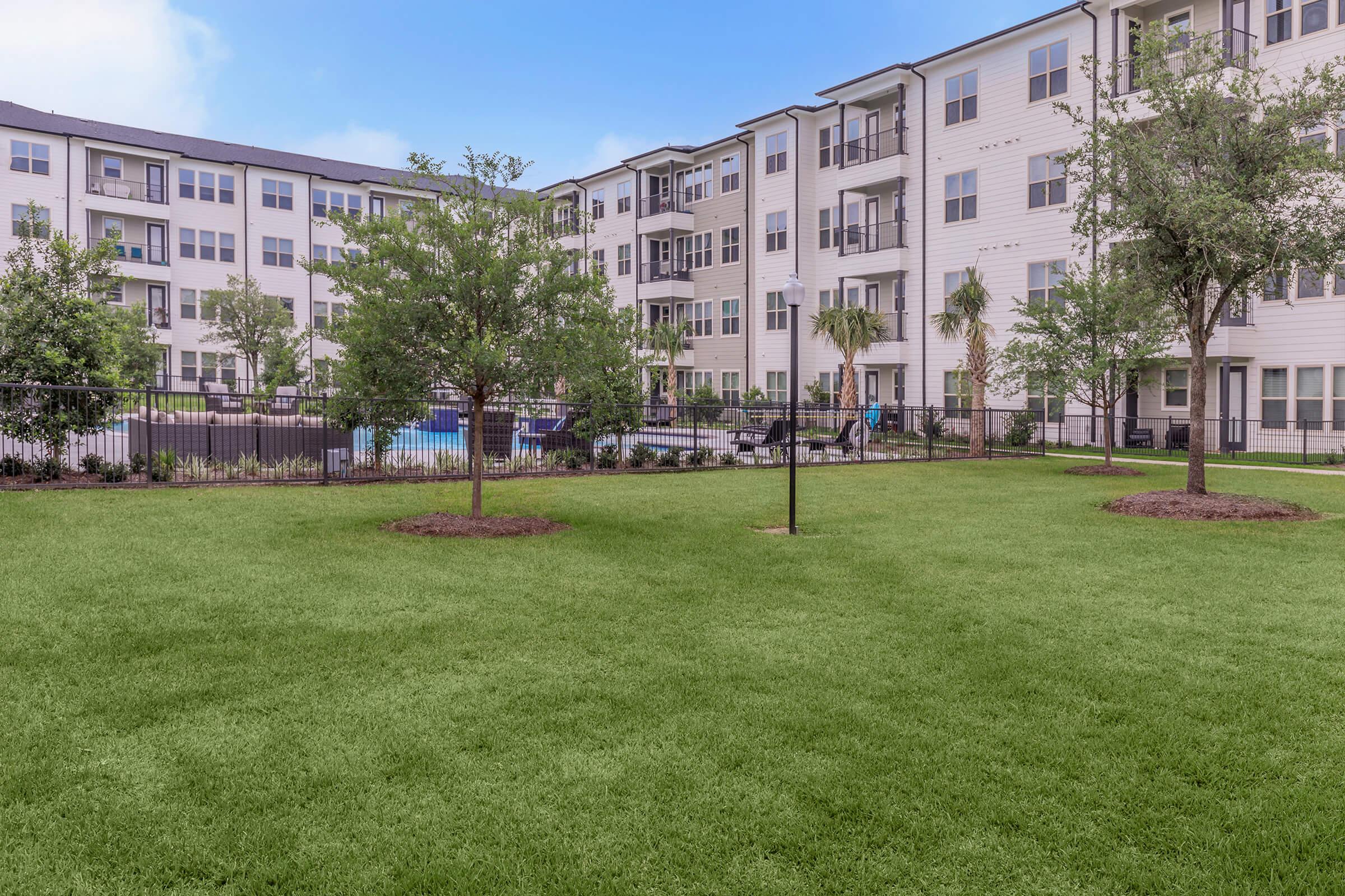 a large lawn in front of a building