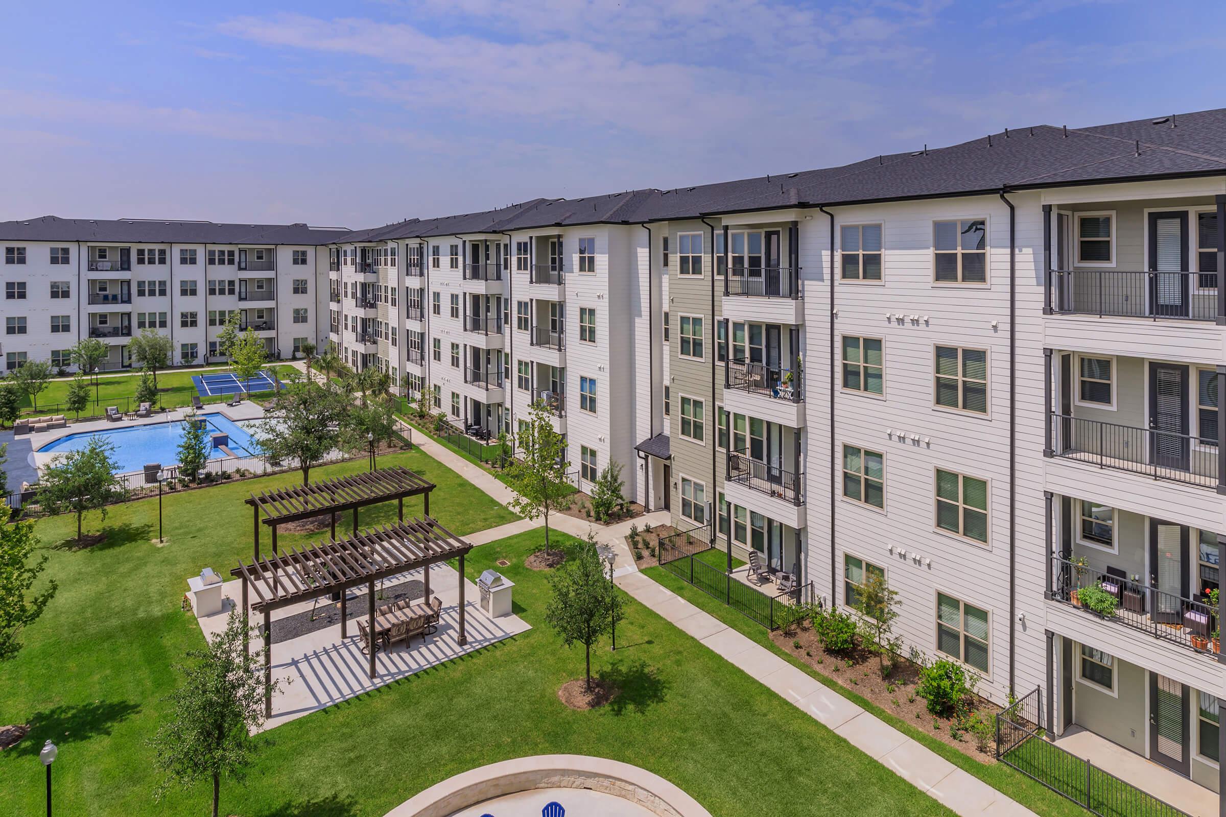 a large lawn in front of a building