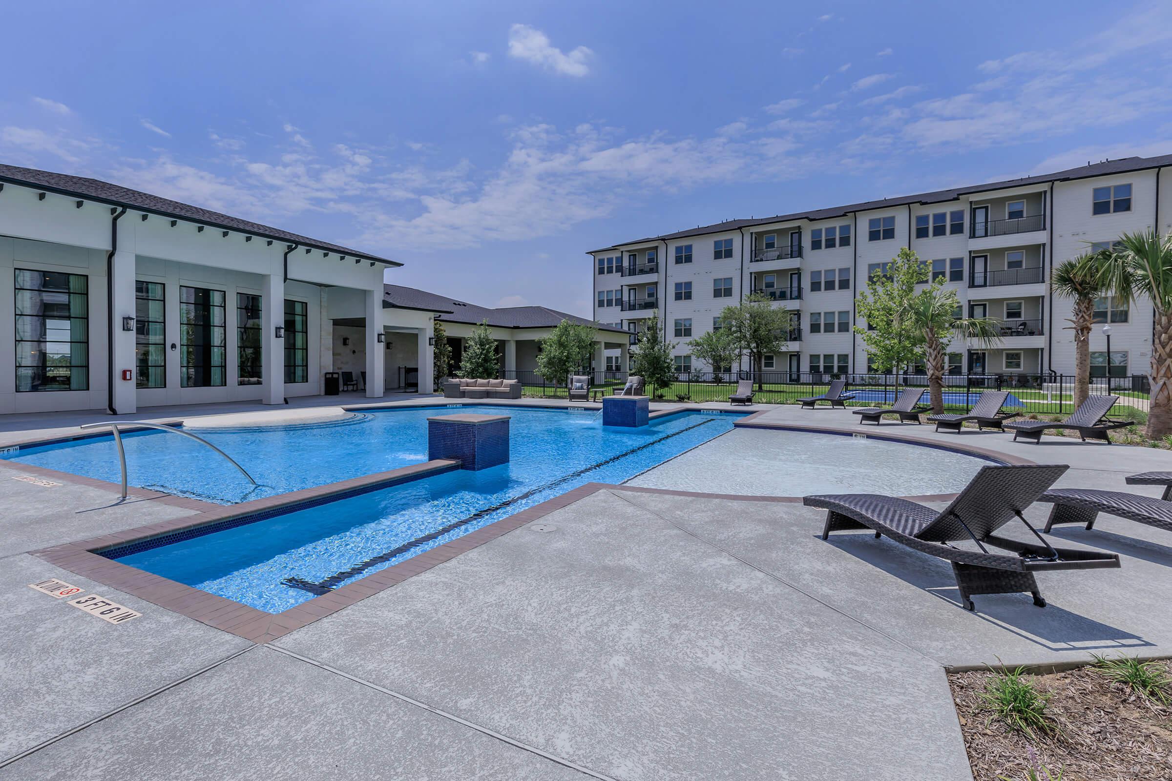 a pool next to a building