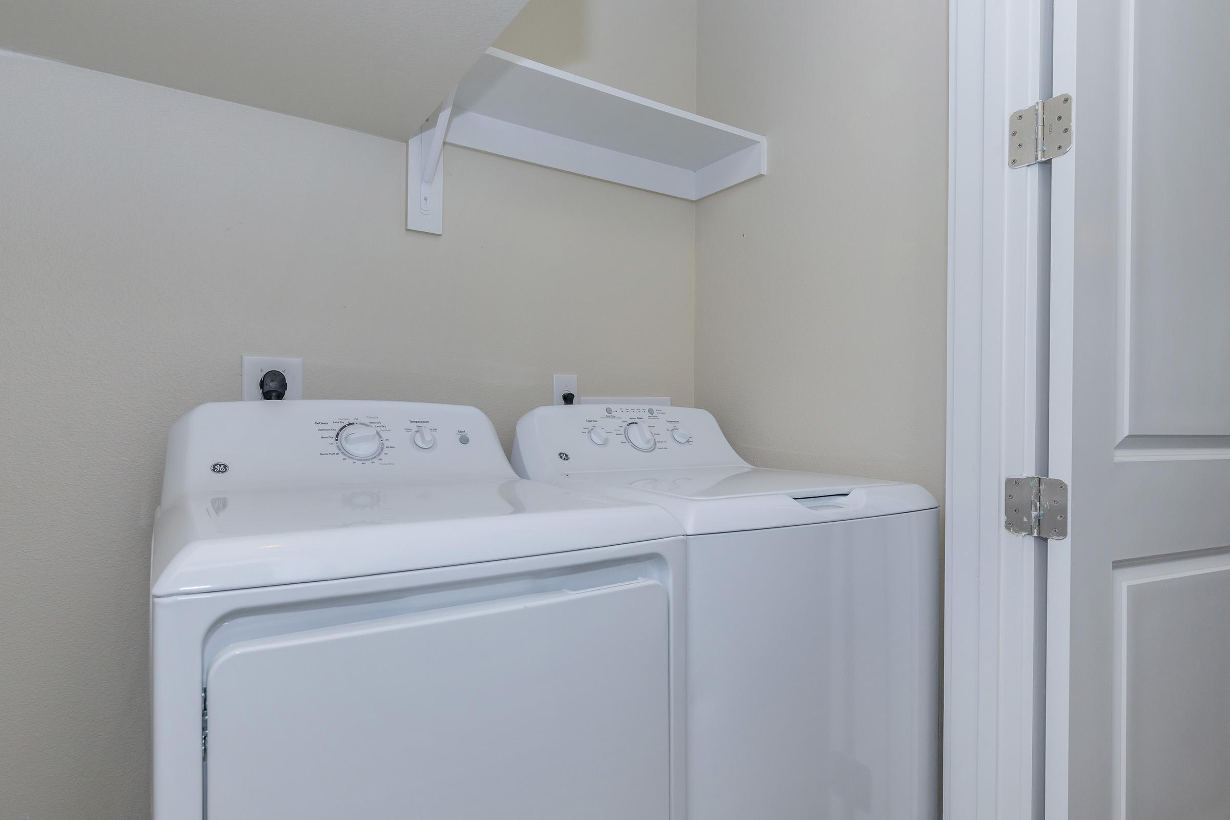 a kitchen with a sink and a refrigerator