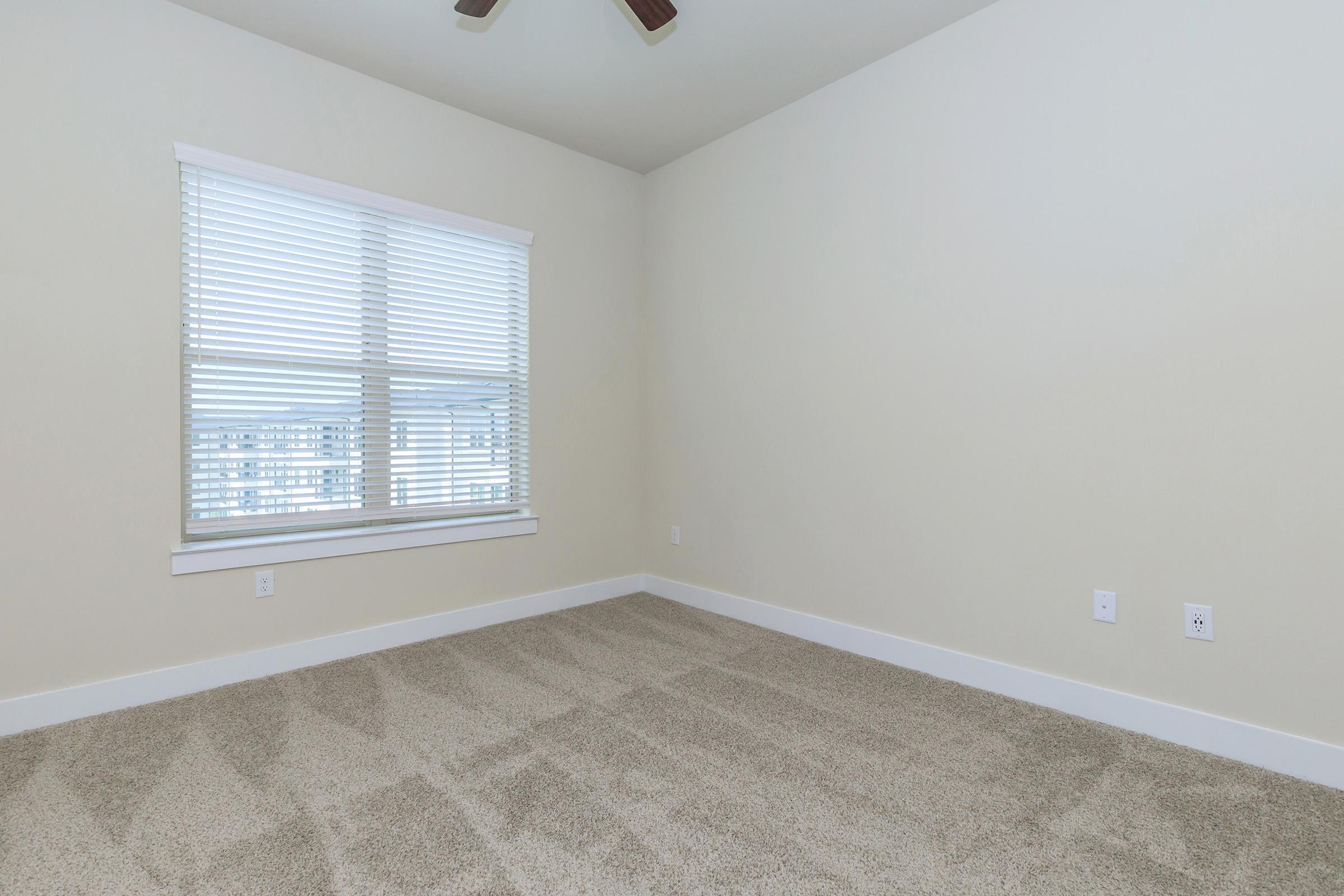 a room with a sink and a window