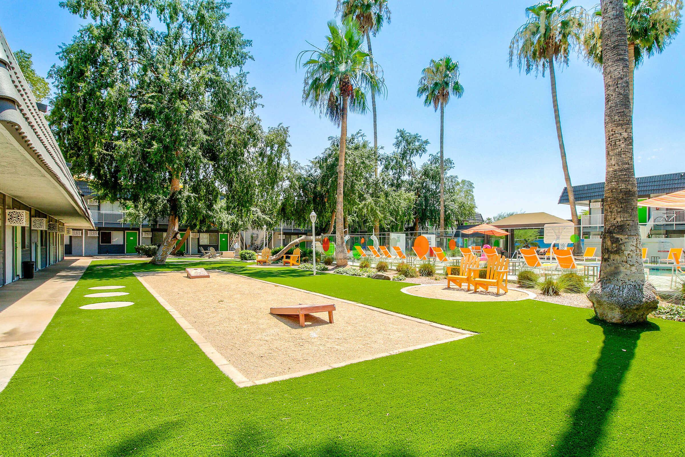 Catch some rays while enjoying Studio 710s cornhole court.