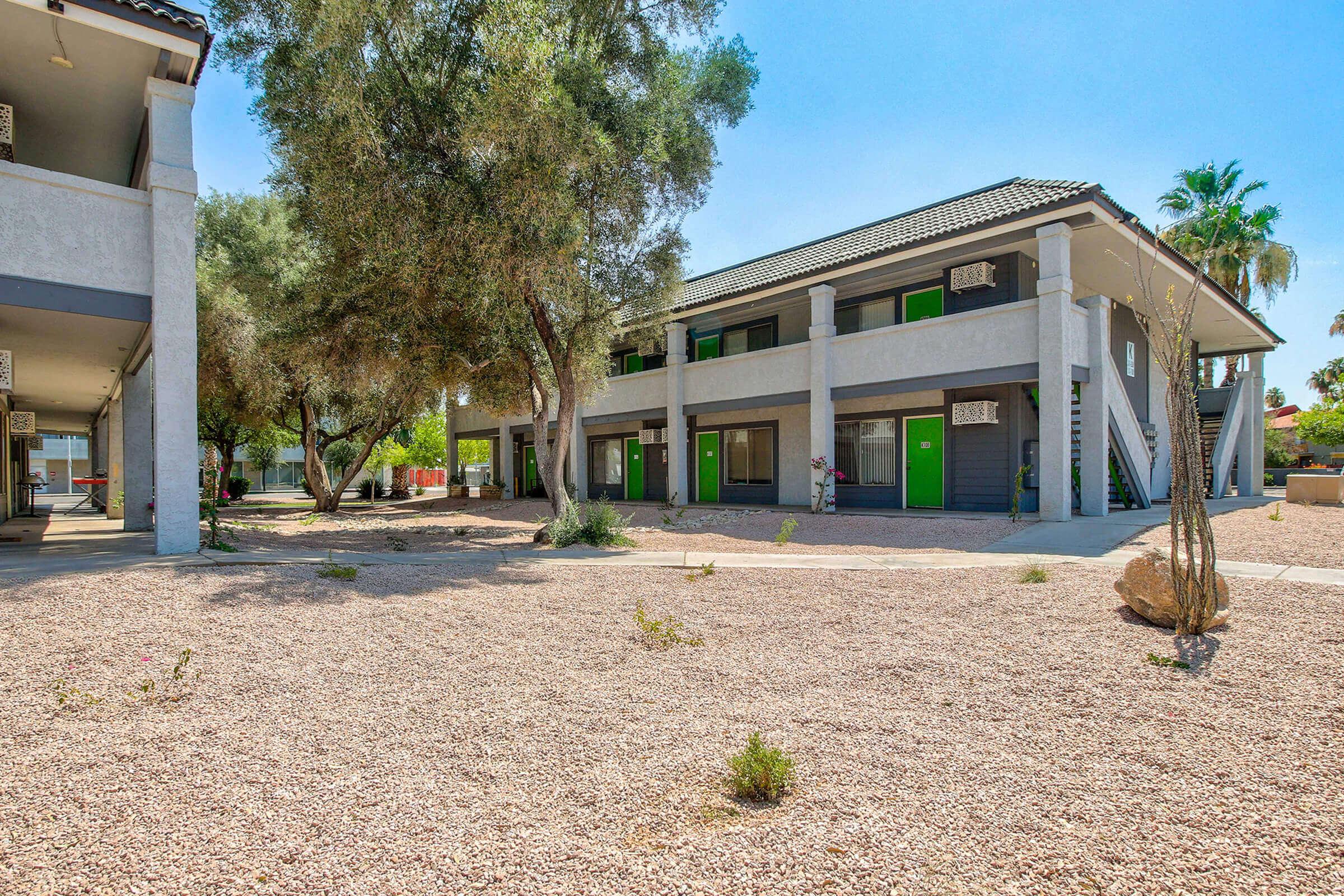 Multi-level homes on Studio 710s landscaped grounds.