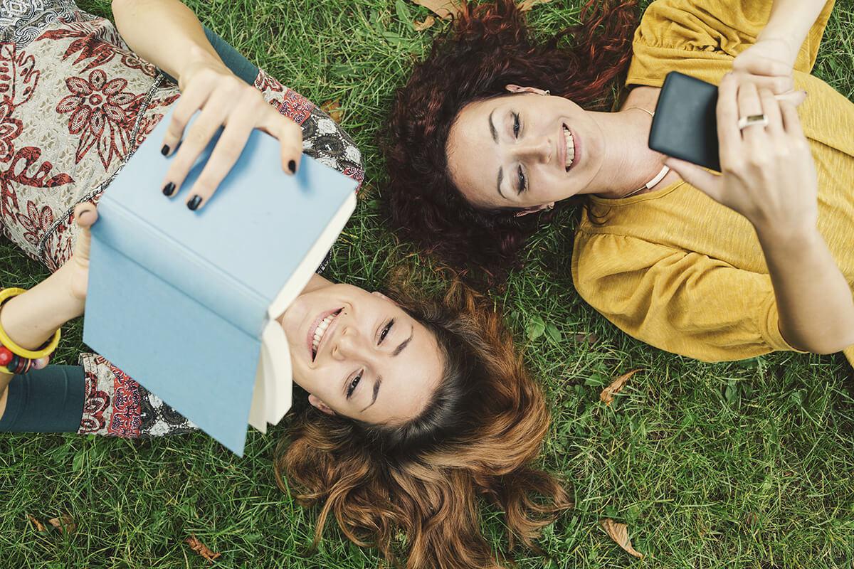 a woman lying in the grass