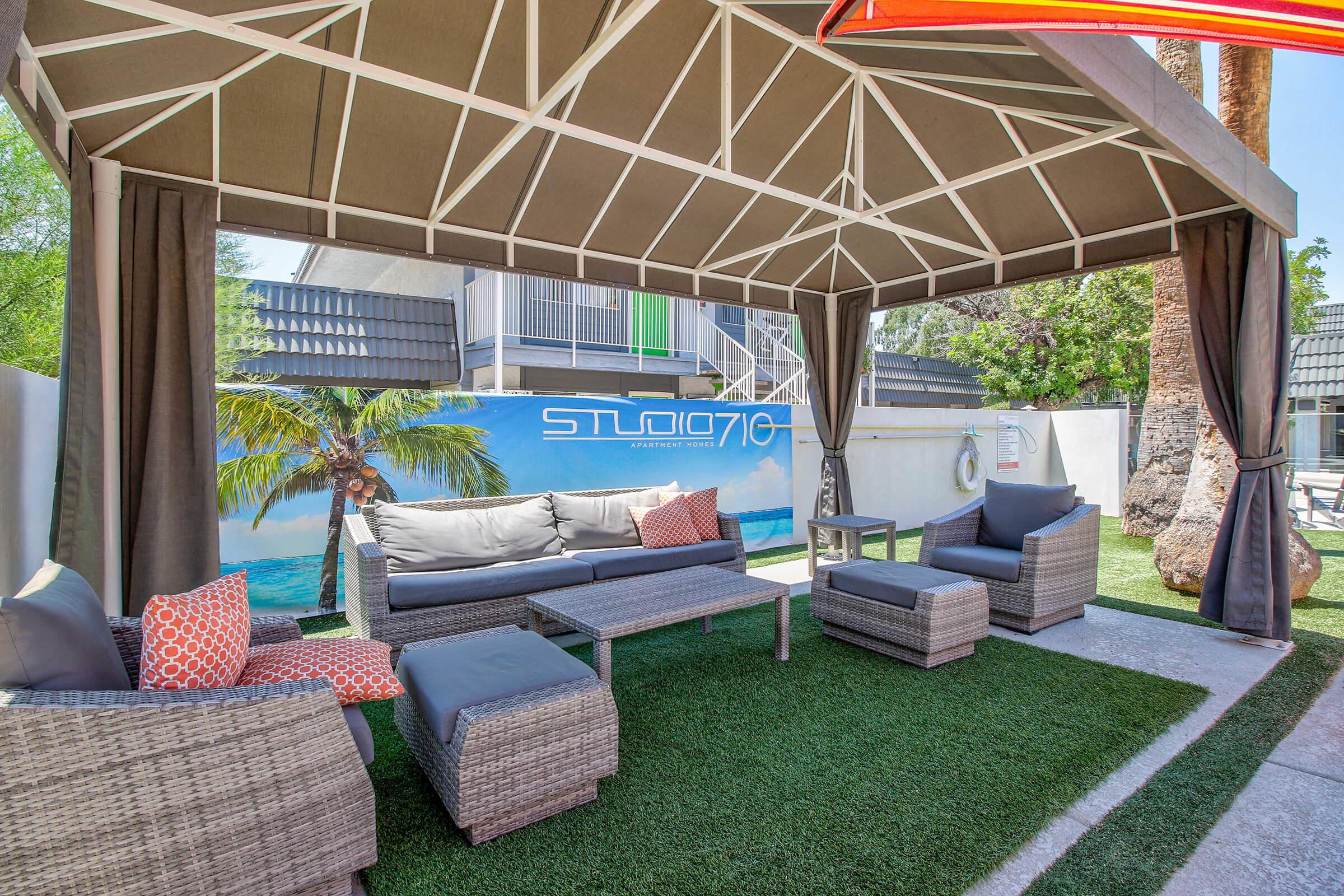 This is the poolside cabana seating of Studio 710.