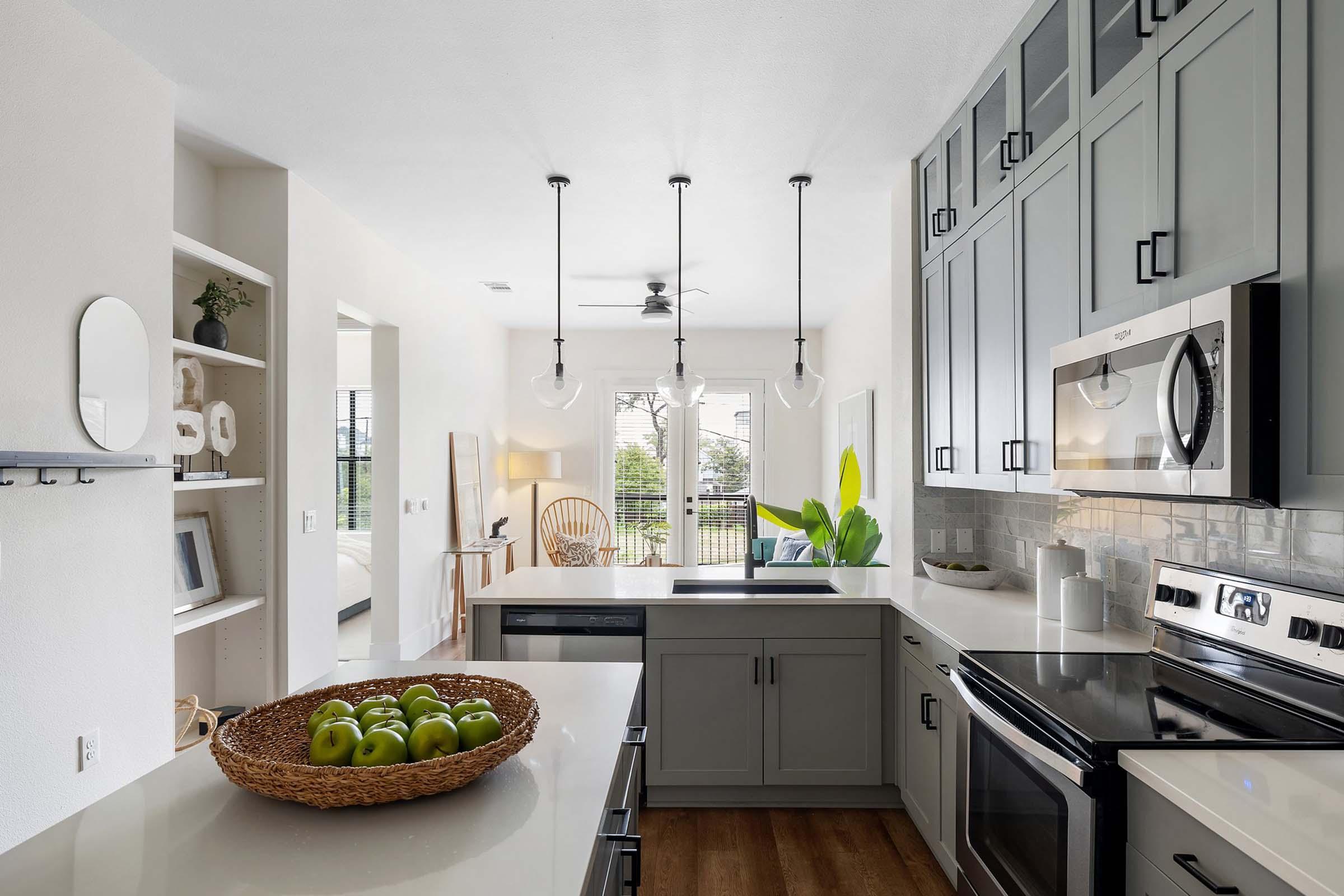 a kitchen with a sink and a window