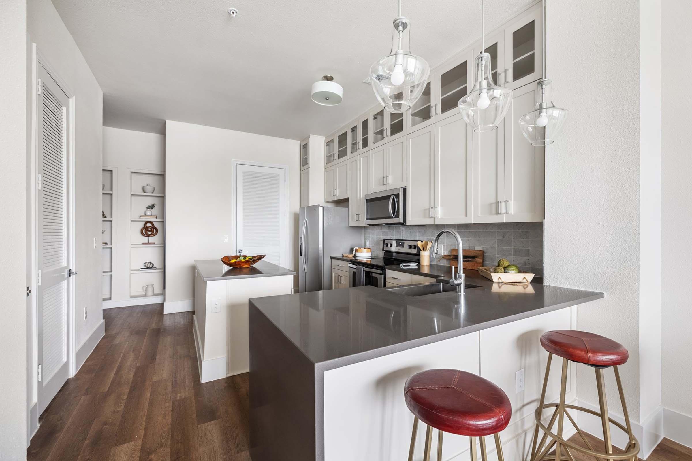 a kitchen with a dining room table