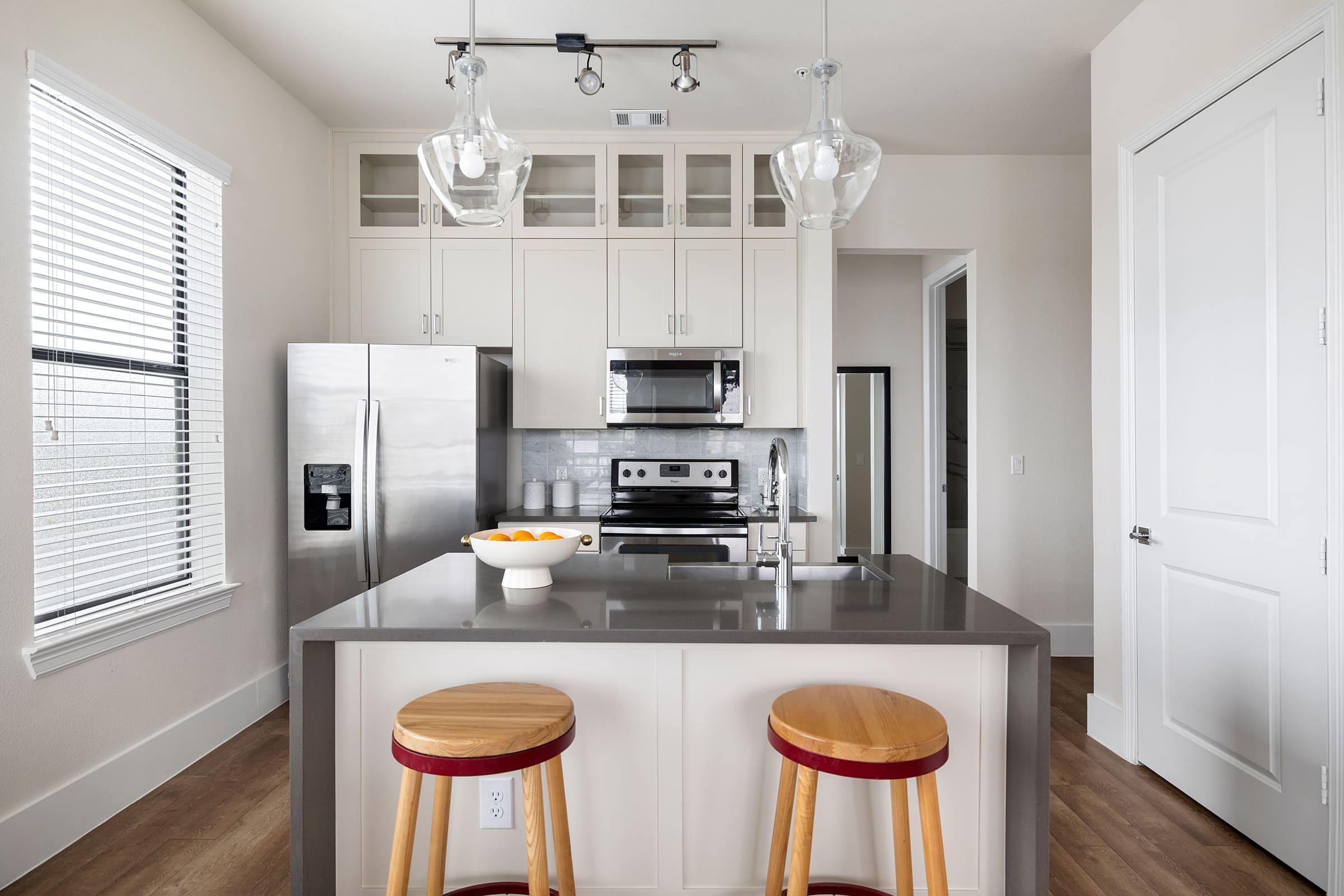 a kitchen with a sink and a window