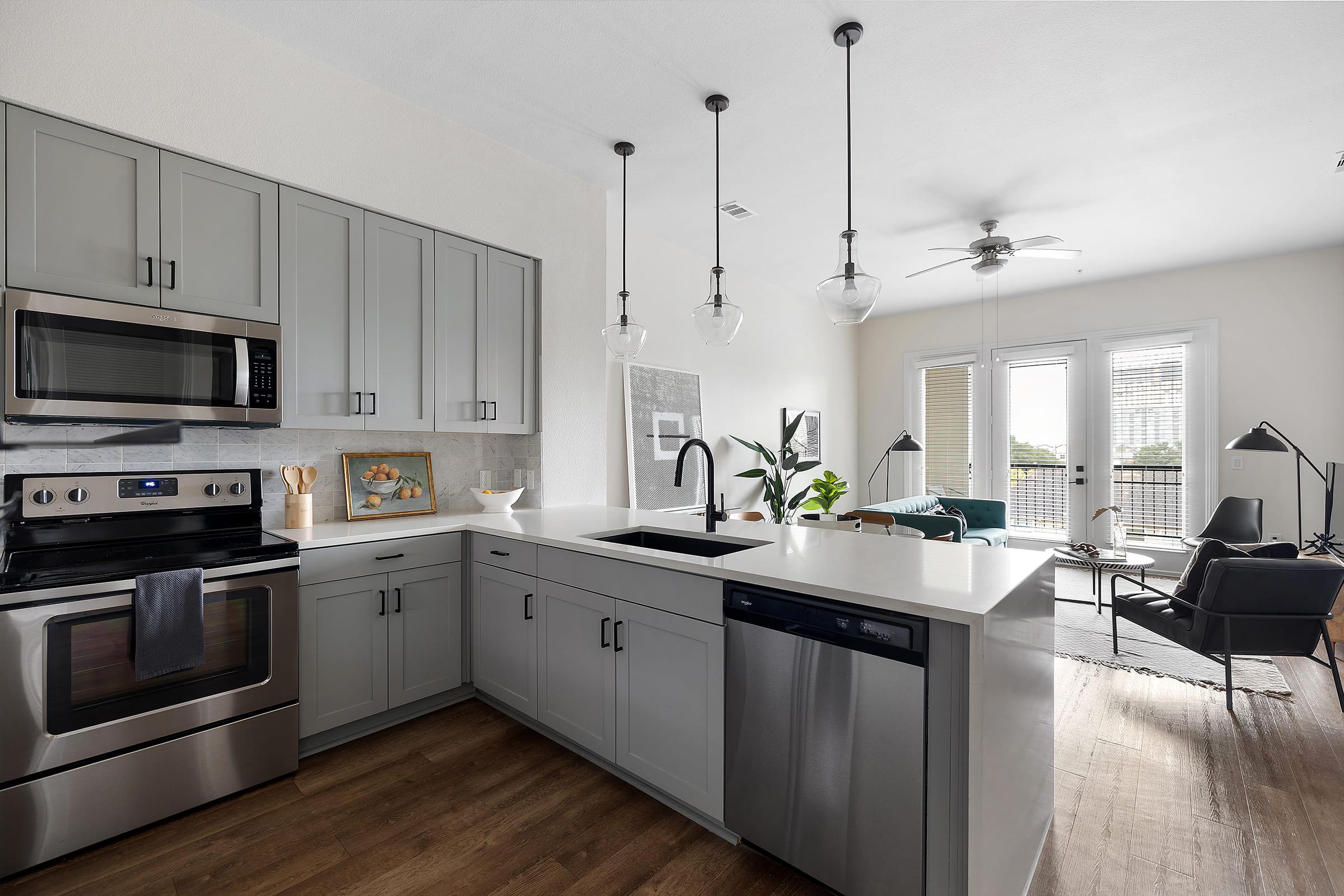 a kitchen with a sink and a window