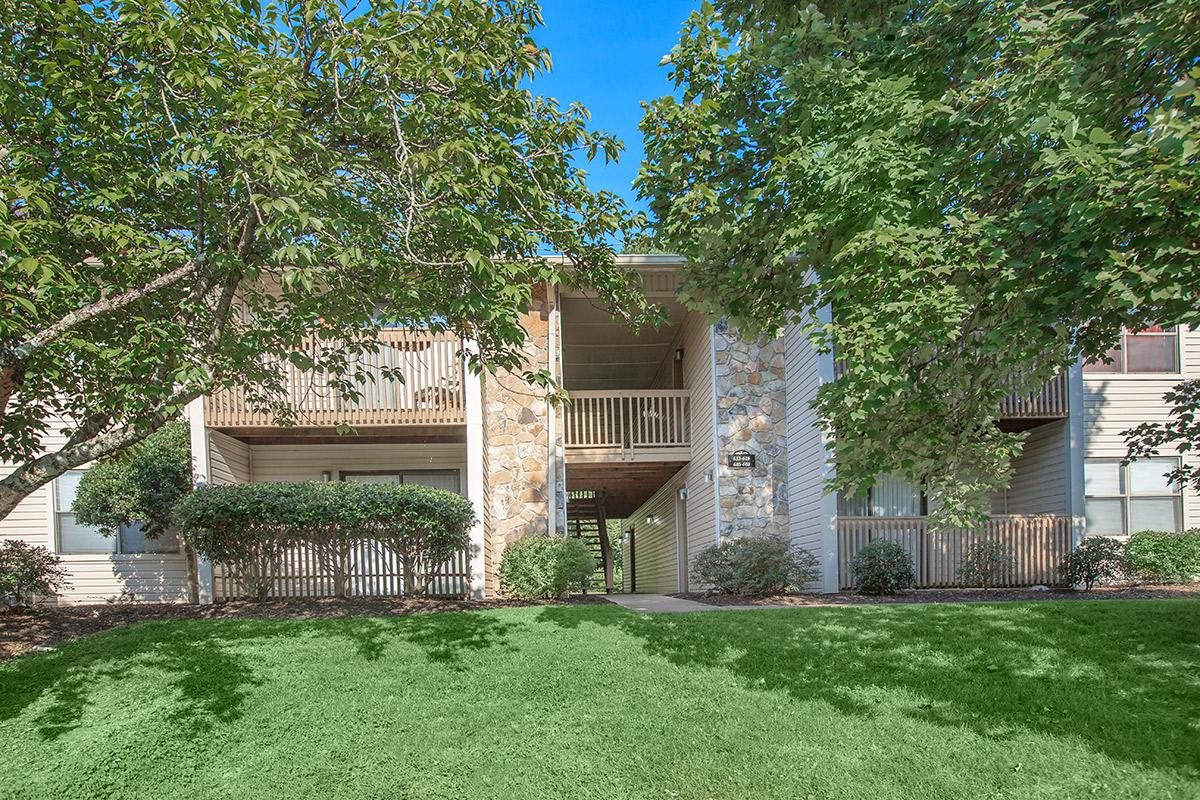 Mature trees and lovely landscaping surrounds Laurel Ridge Apartments