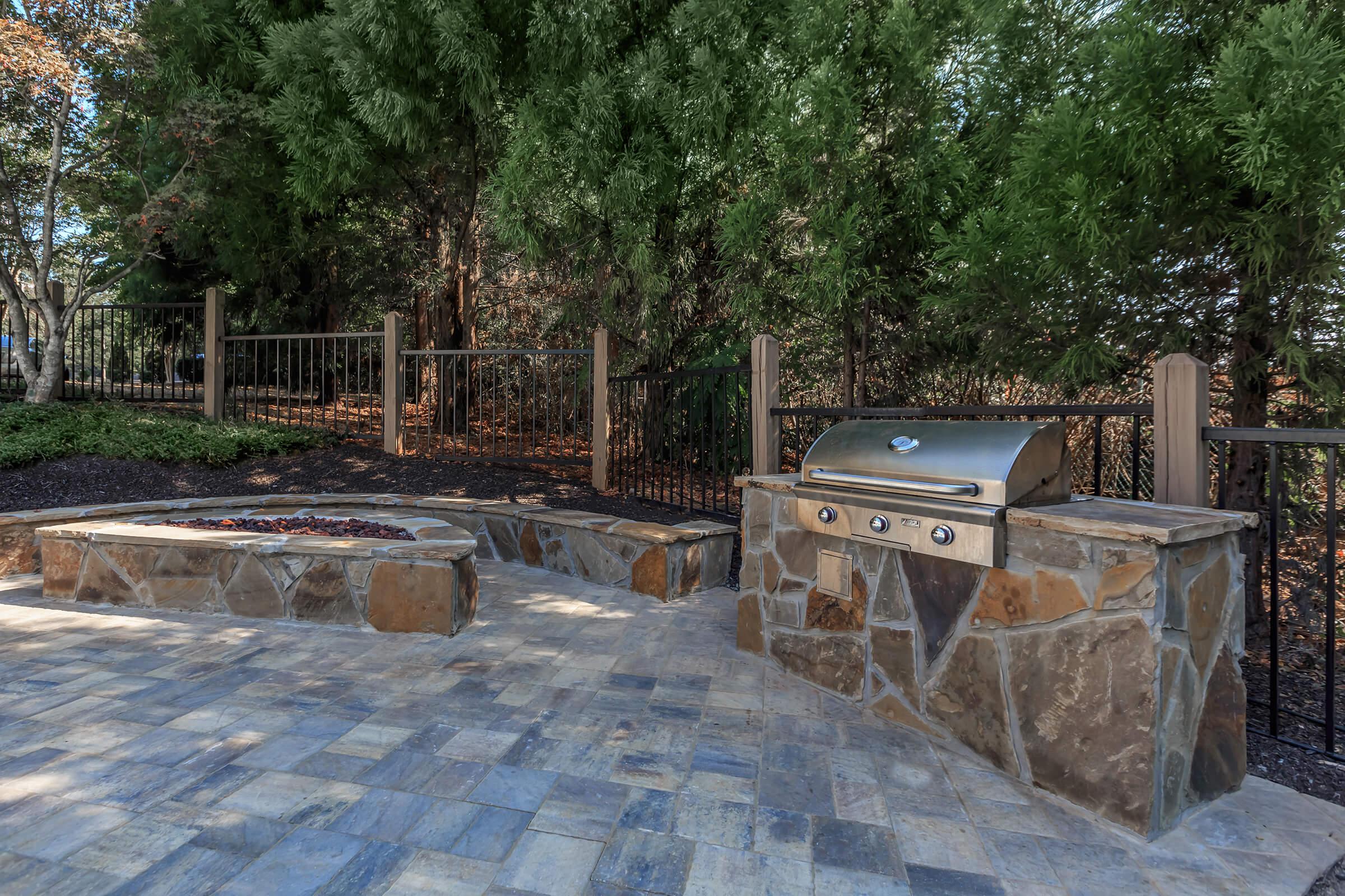 New Fire Pit and Gas Grills by the Pool at Laurel Ridge Apartments in Chattanooga, Tennessee