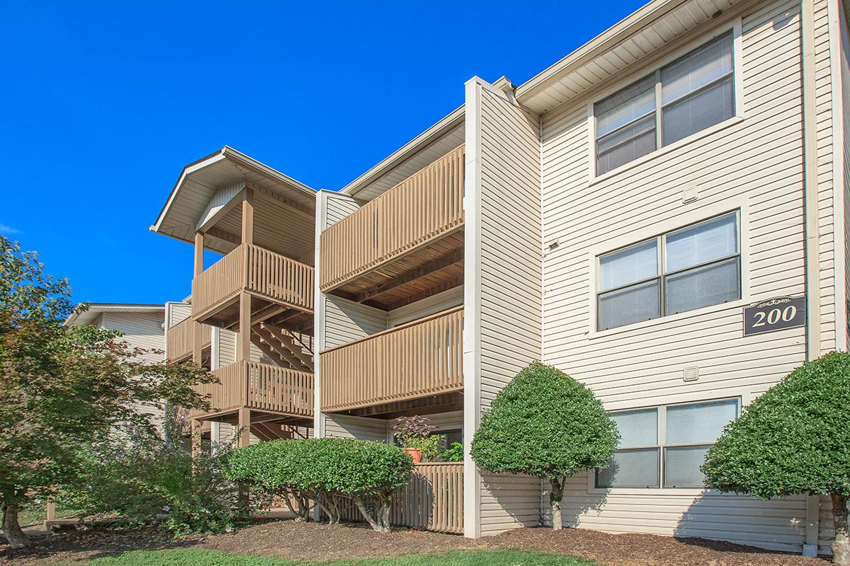 The Laurel Ridge Apartments Three Story Building with Balconies and Patios