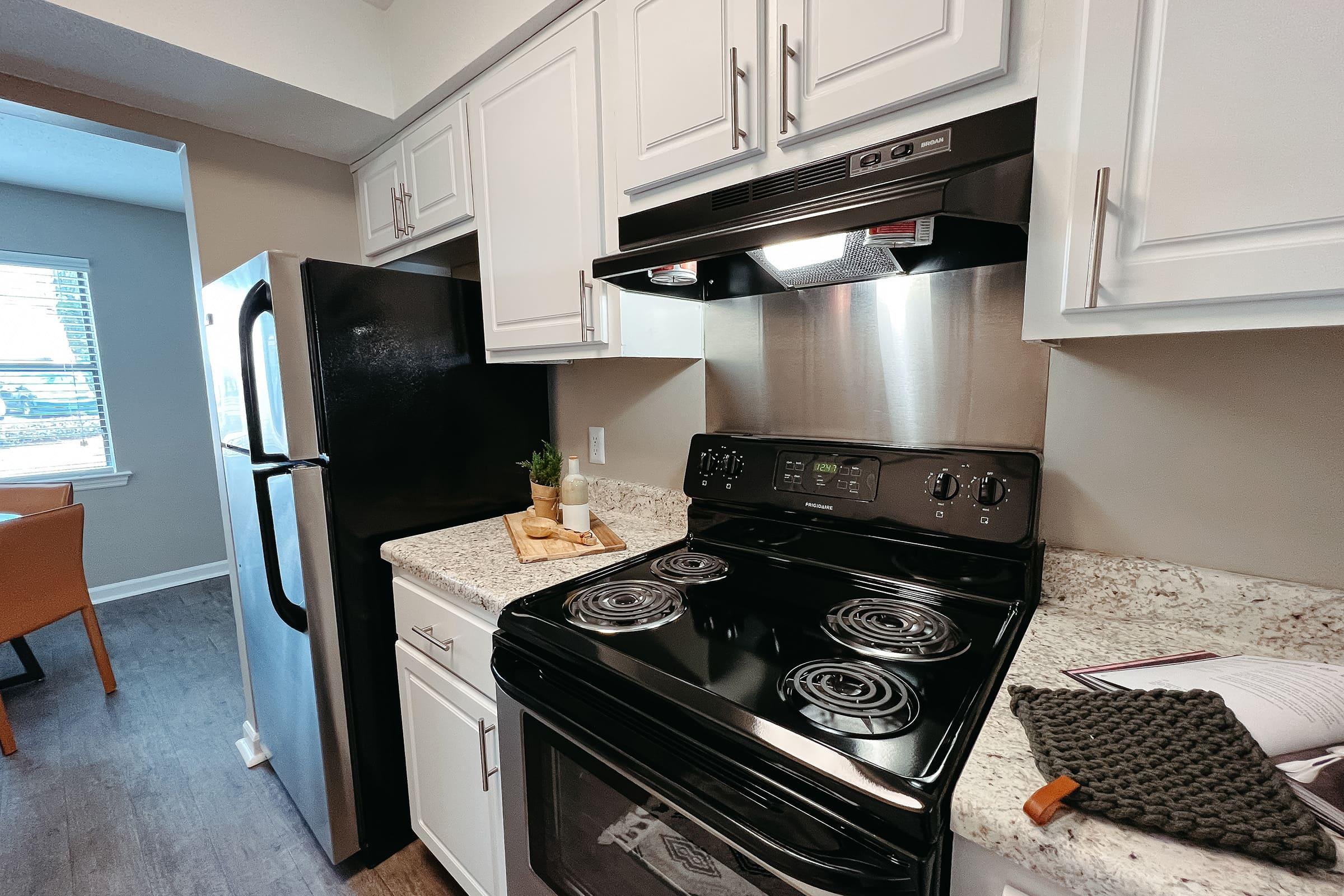 a stove top oven sitting inside of a box