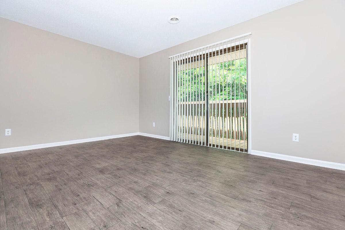 Vertical Blinds and Hardwood Floors in the Willow at Laurel Ridge Apartments