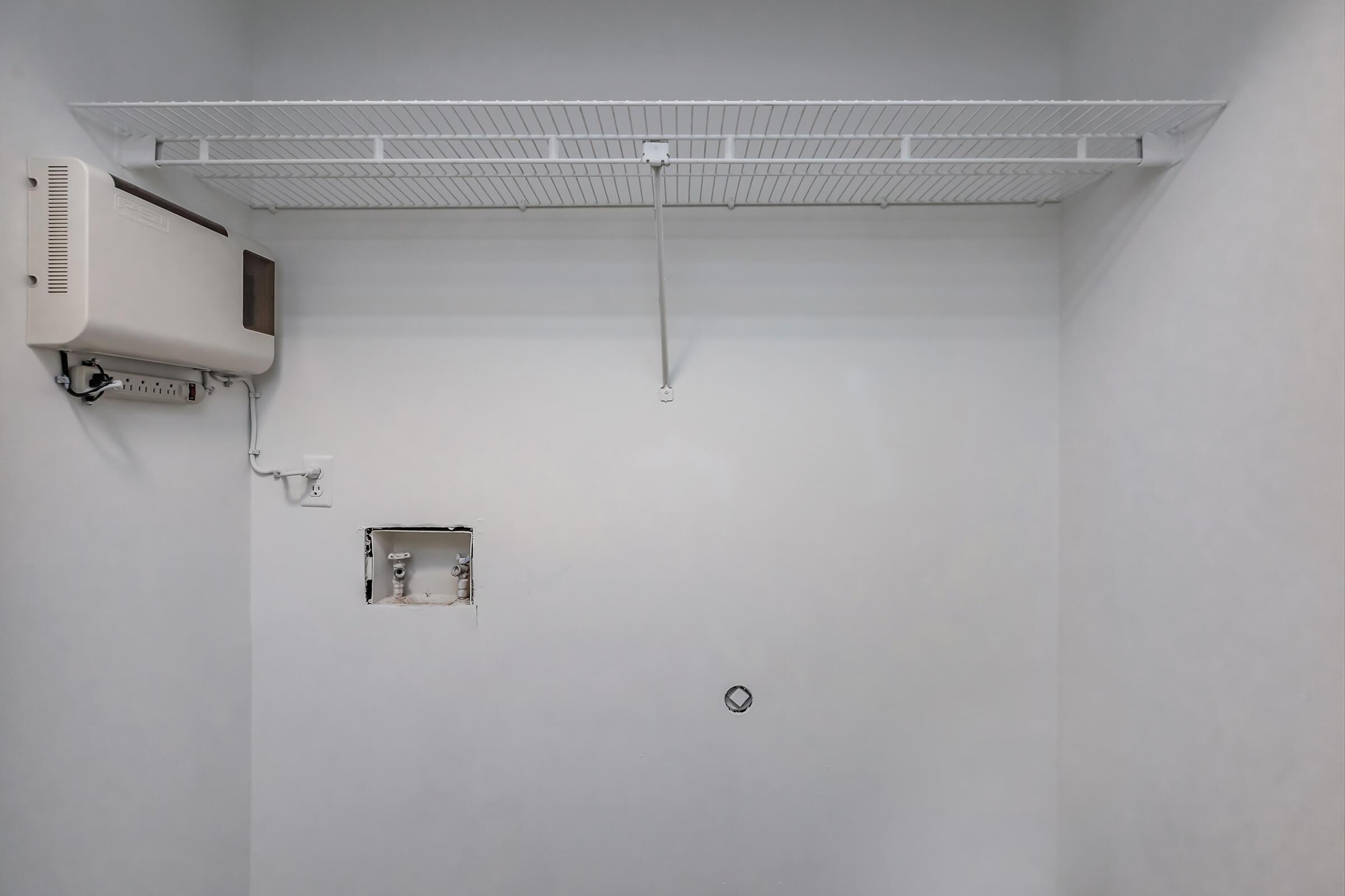 a white refrigerator freezer sitting in a room