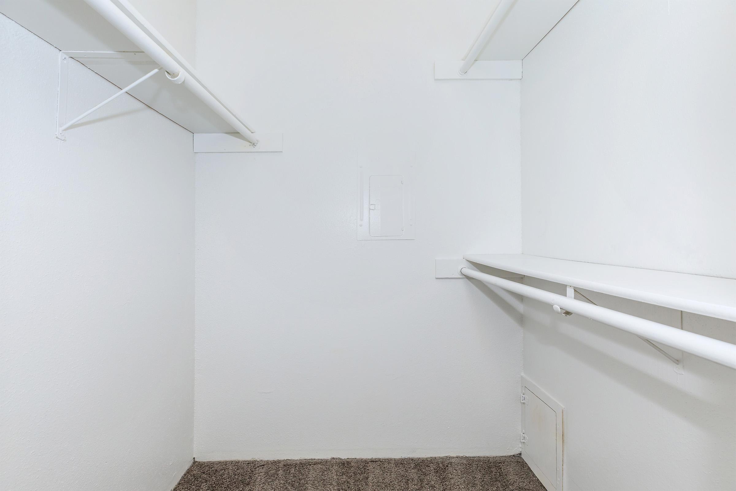 a white refrigerator freezer sitting next to a sink