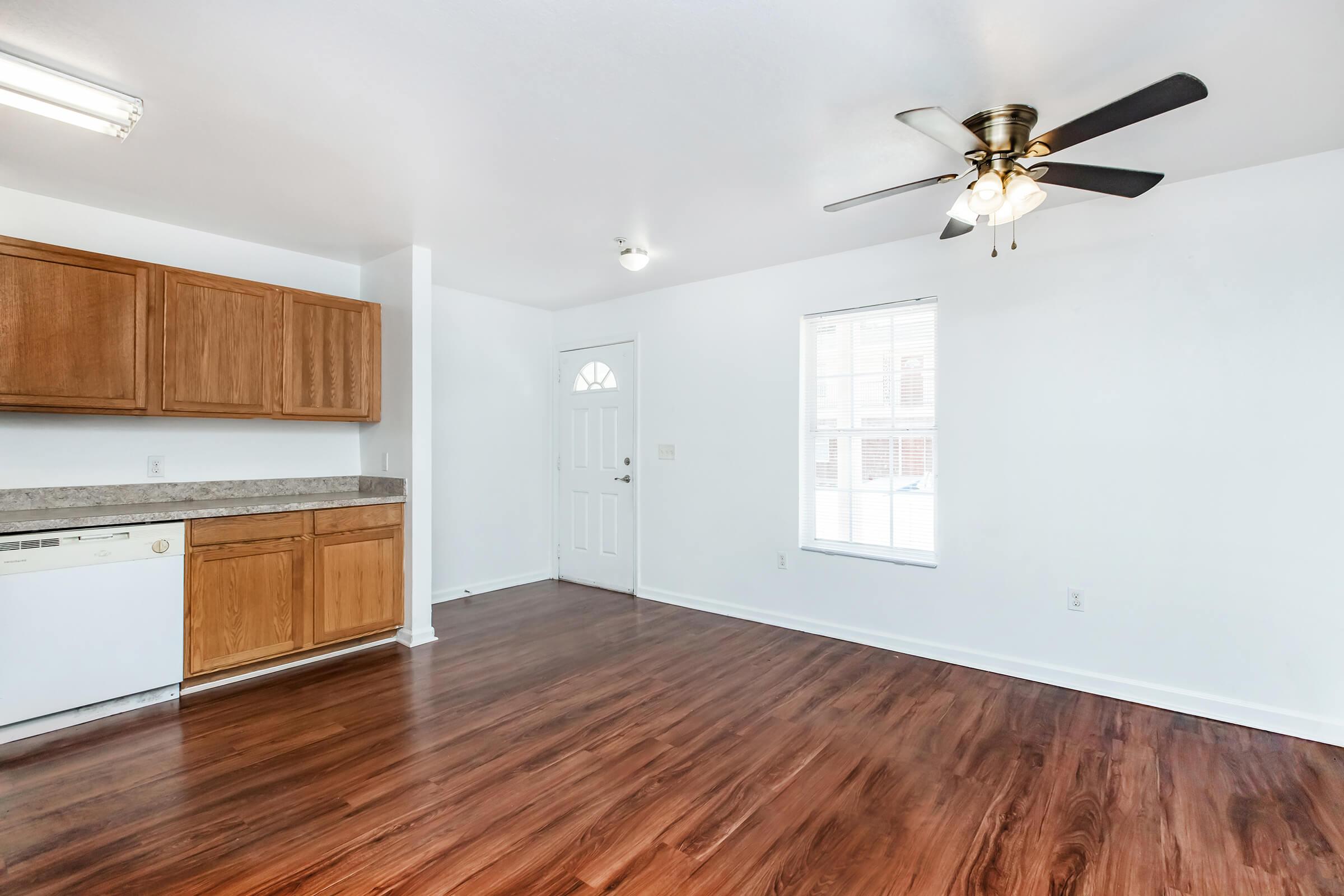 a kitchen with a wood floor