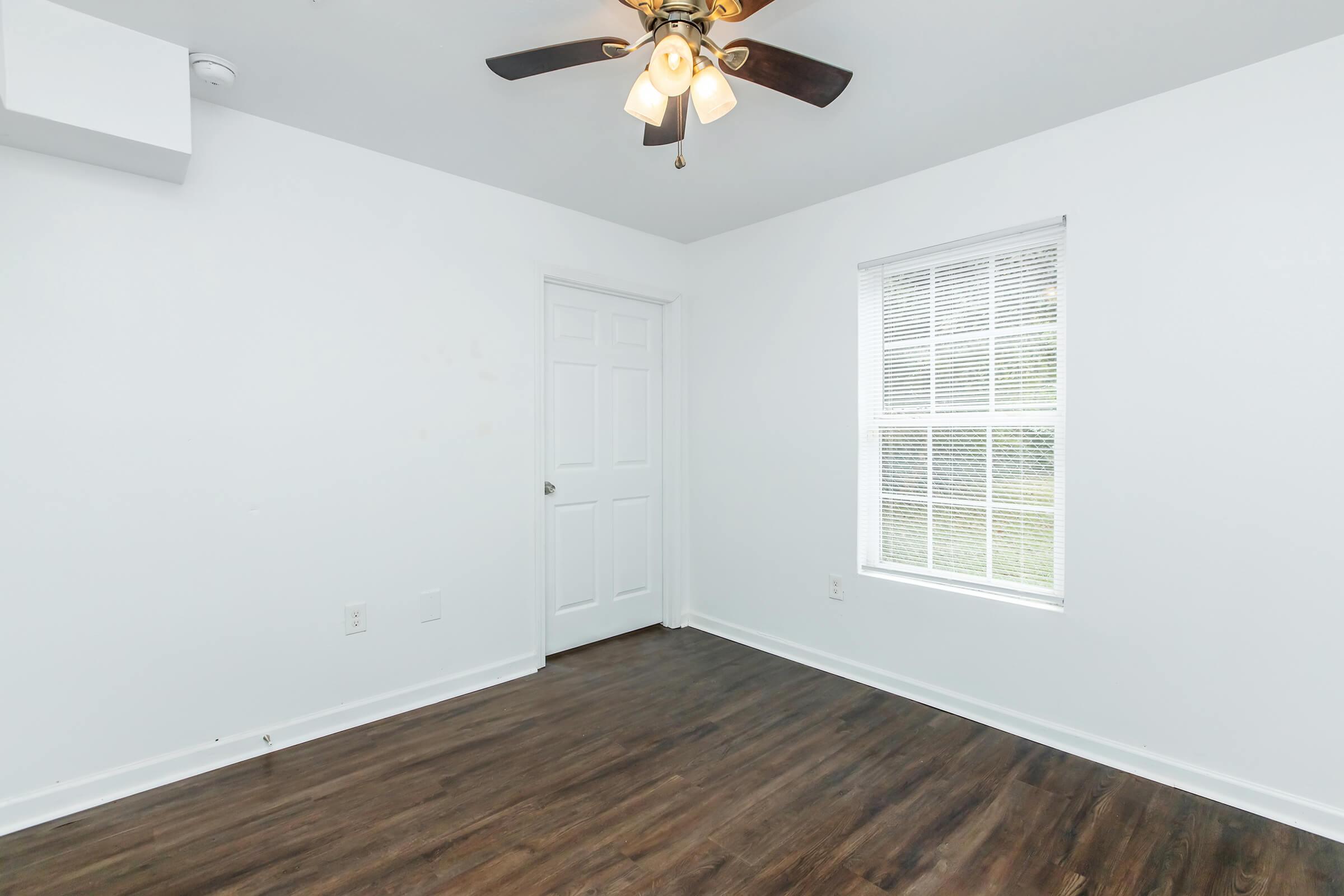 a kitchen with a wooden floor