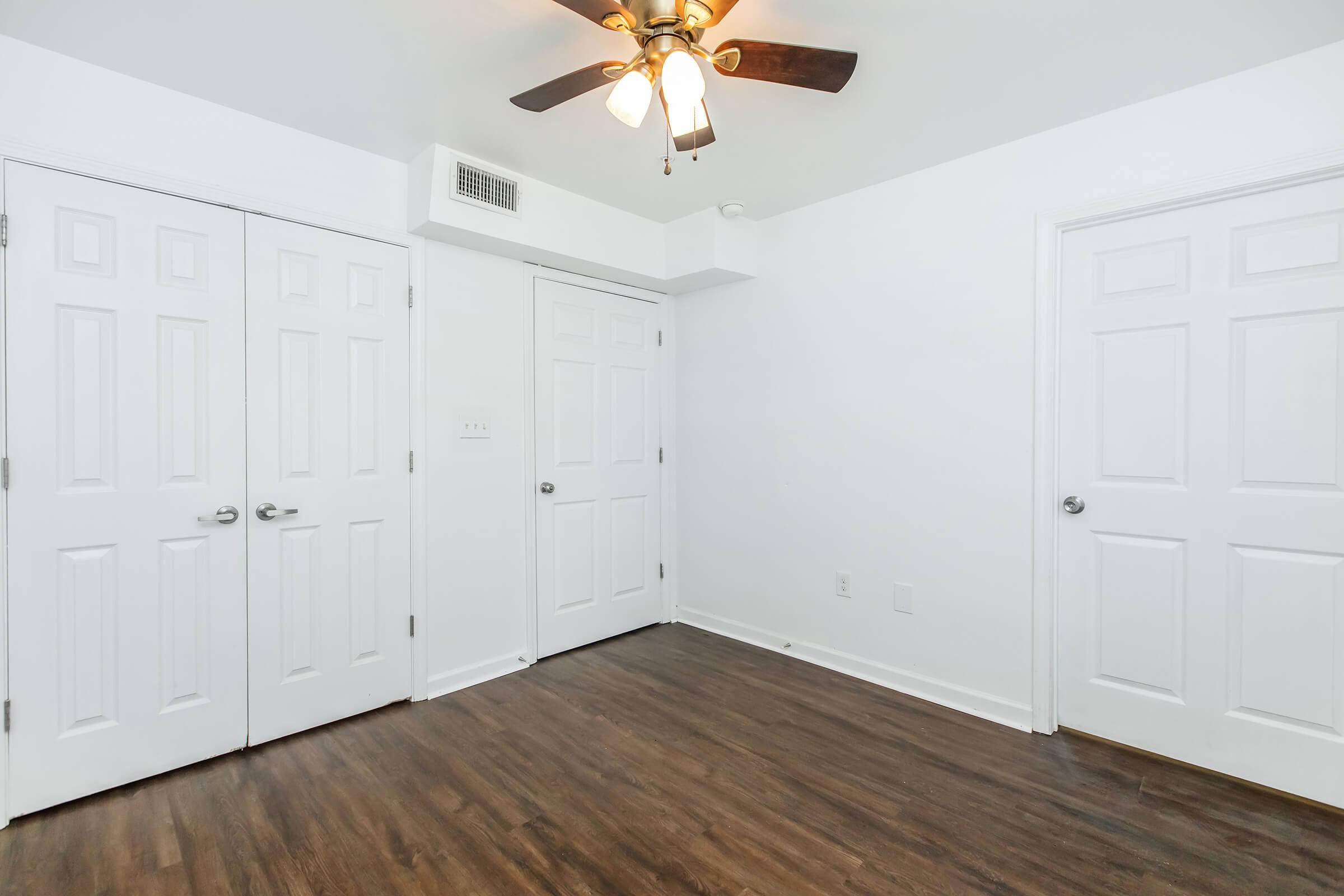 a kitchen with a wooden floor