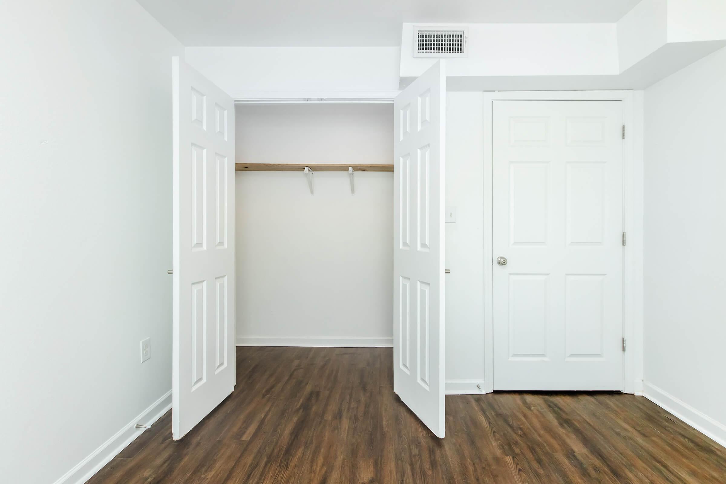 a kitchen with a wood floor