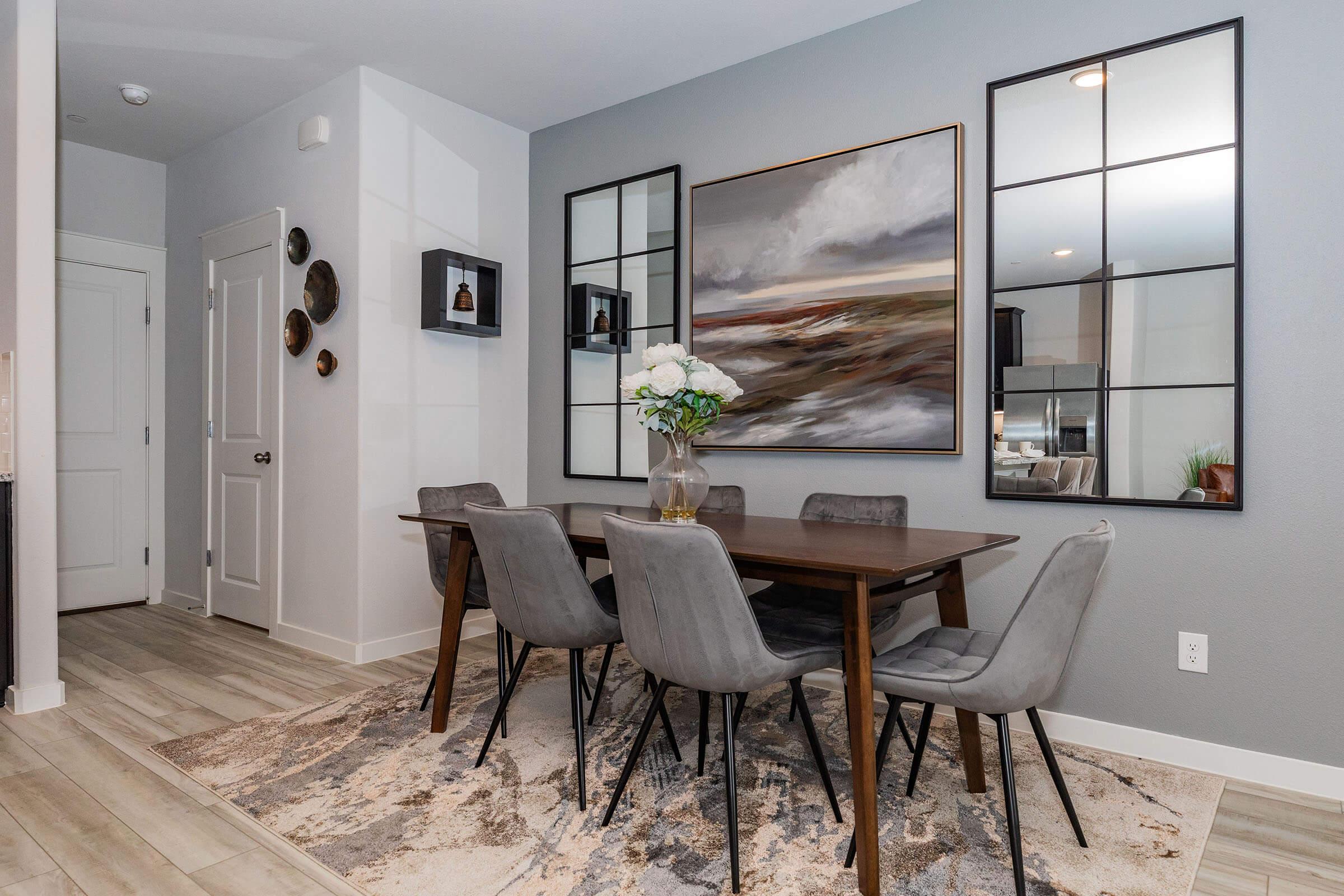 a room filled with furniture and a large window