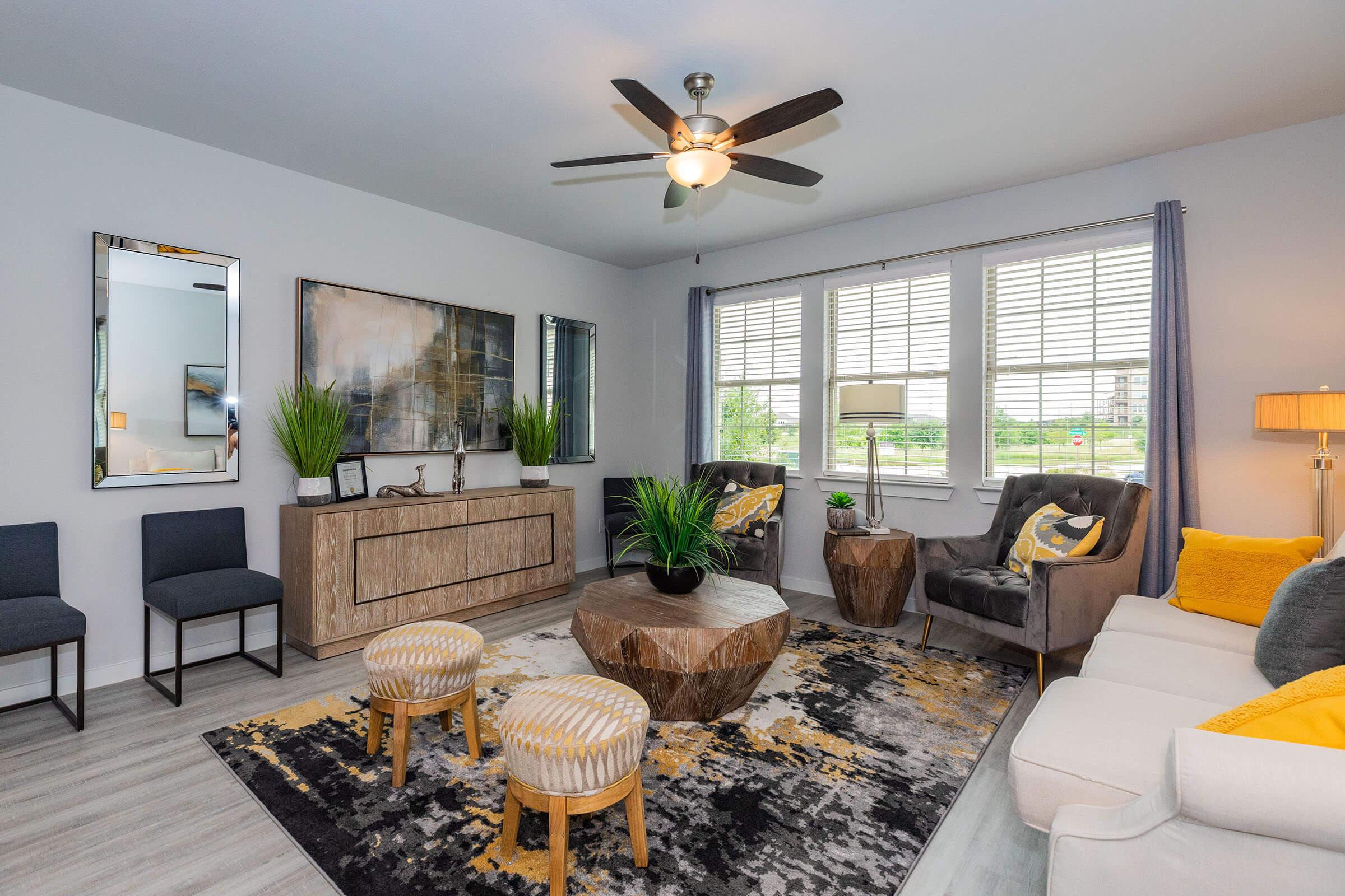 a living room filled with furniture and a fire place