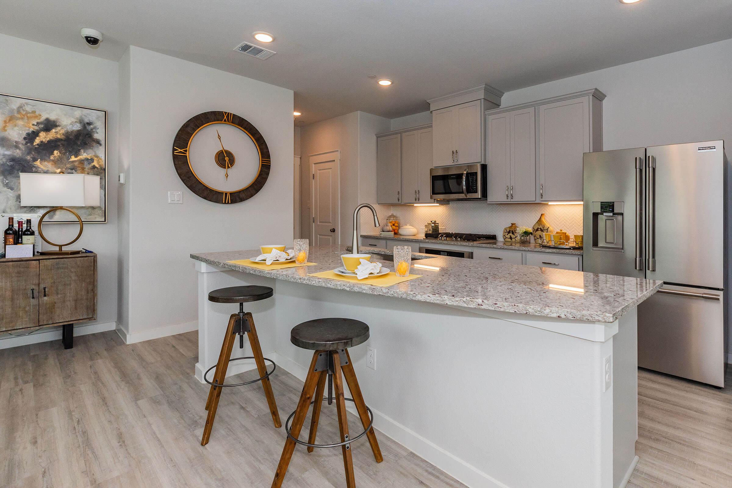 a kitchen with a table in a room