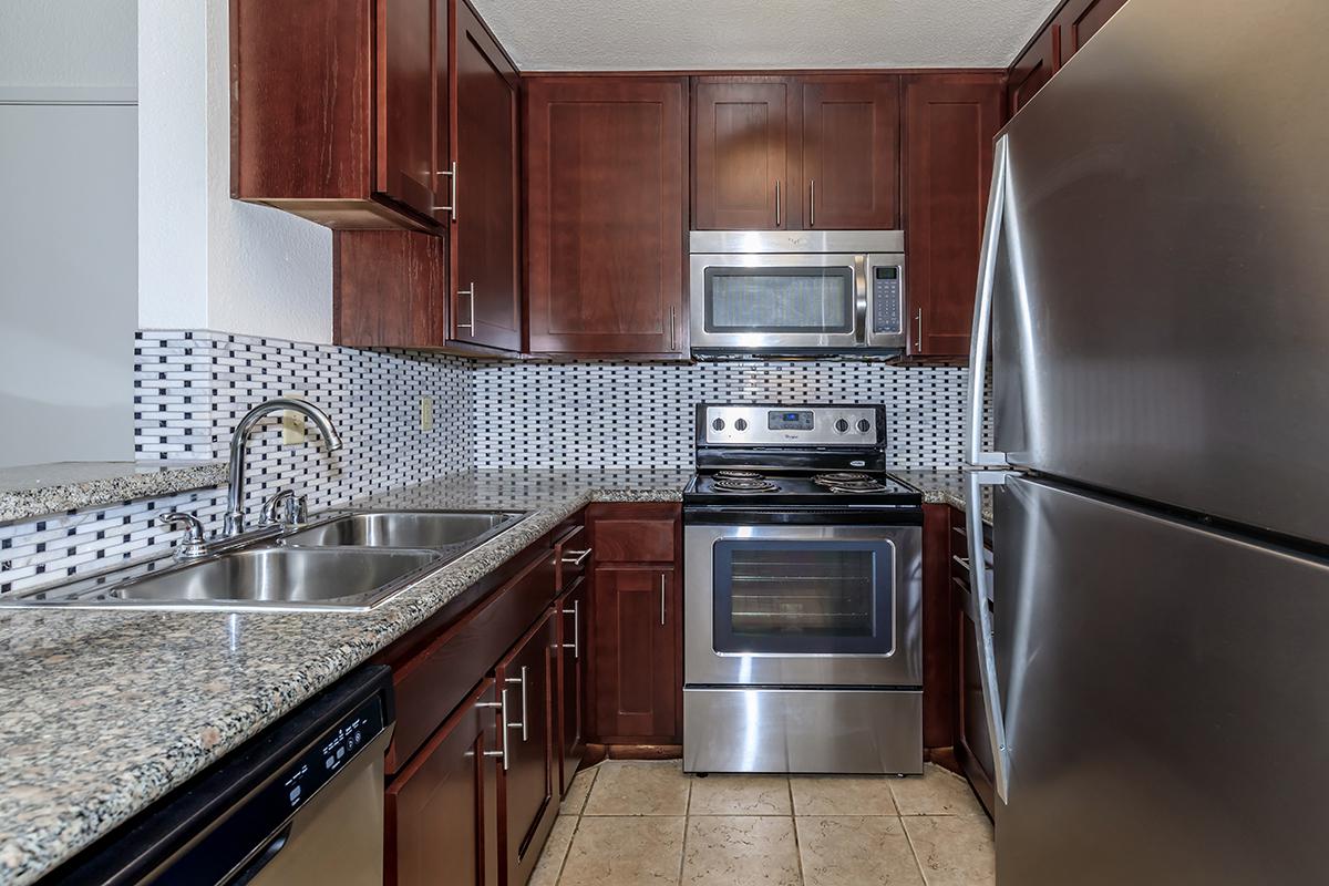 a kitchen with stainless steel appliances