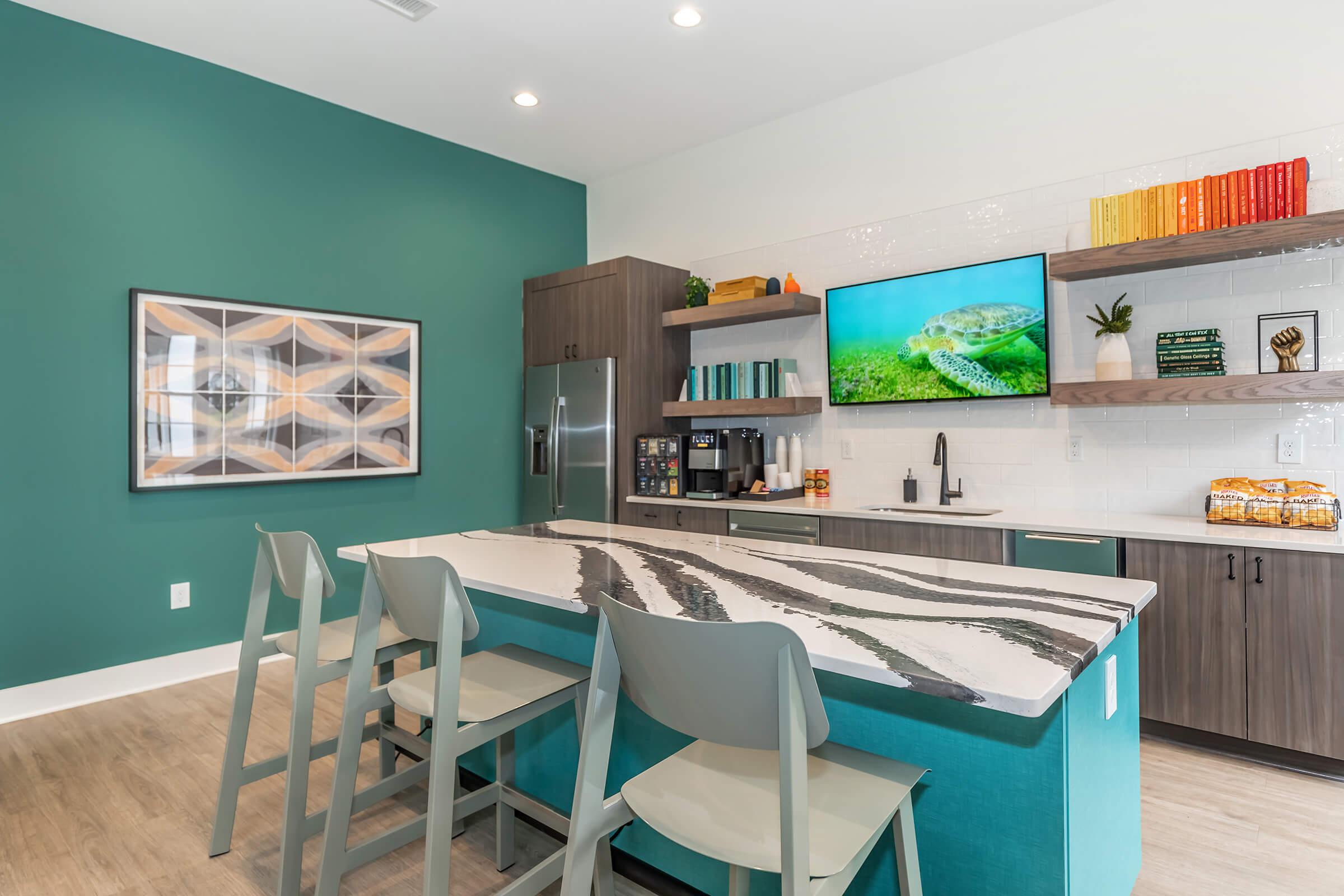 a kitchen with a dining room table