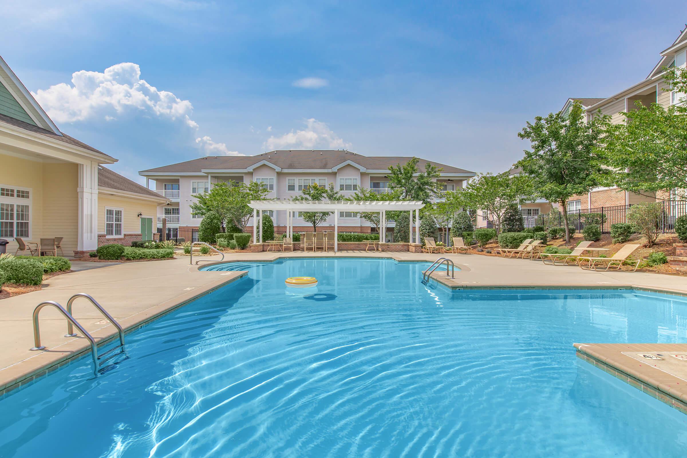 Take A Dip In Our Shimmering Swimming Pool In Heather Ridge In Charlotte, NC 