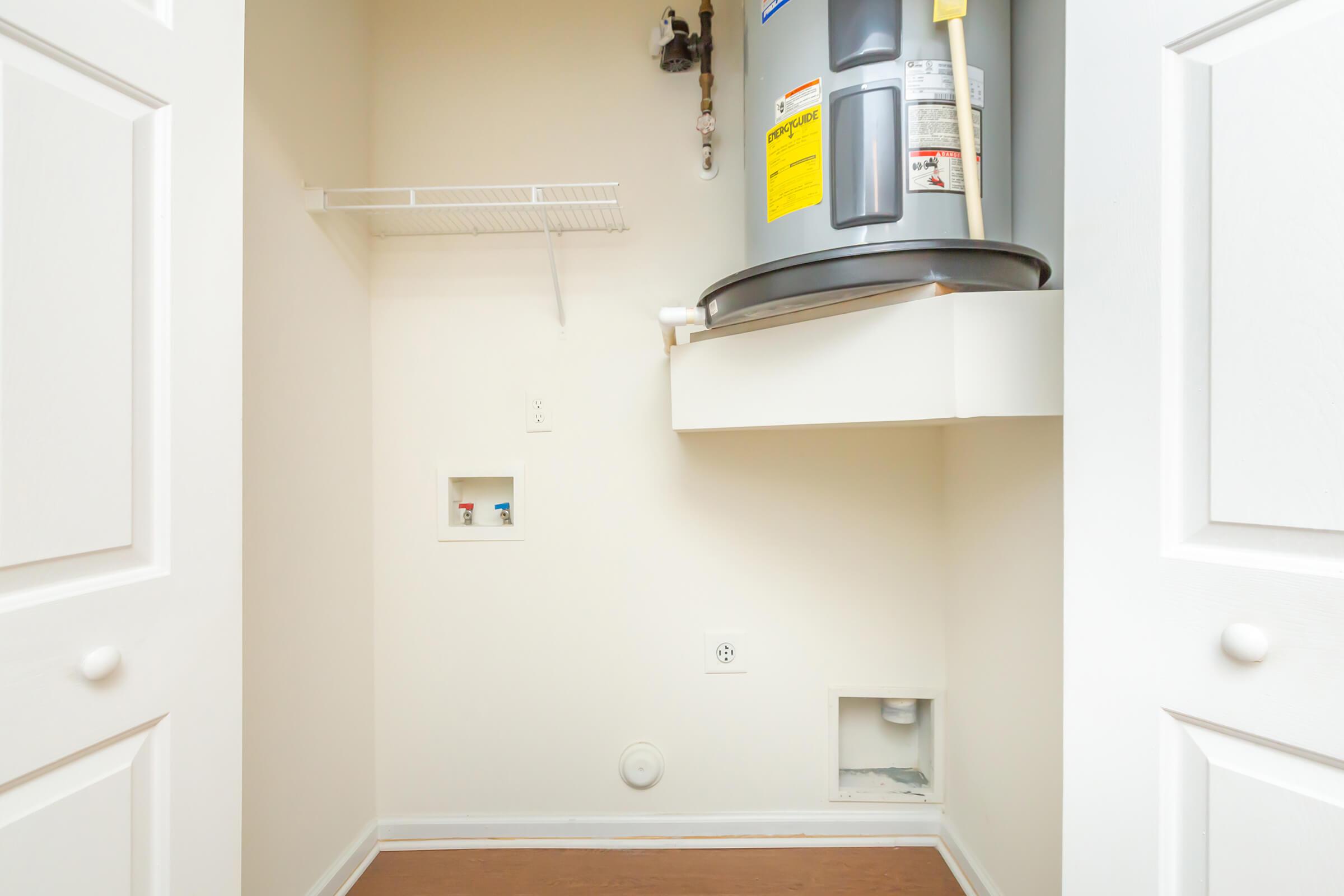 a white sink sitting next to a door