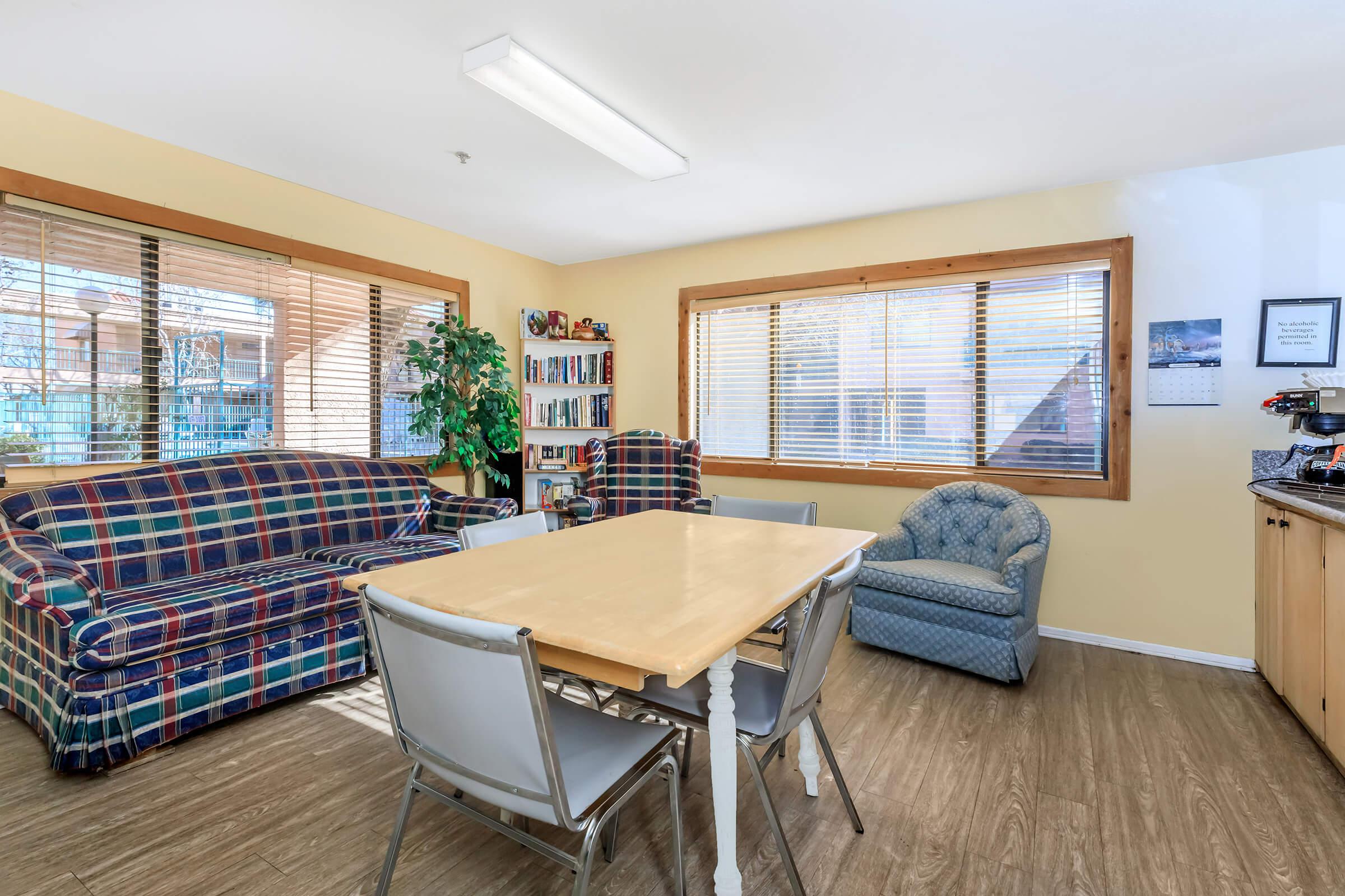 Cedar Town Square community room with couches