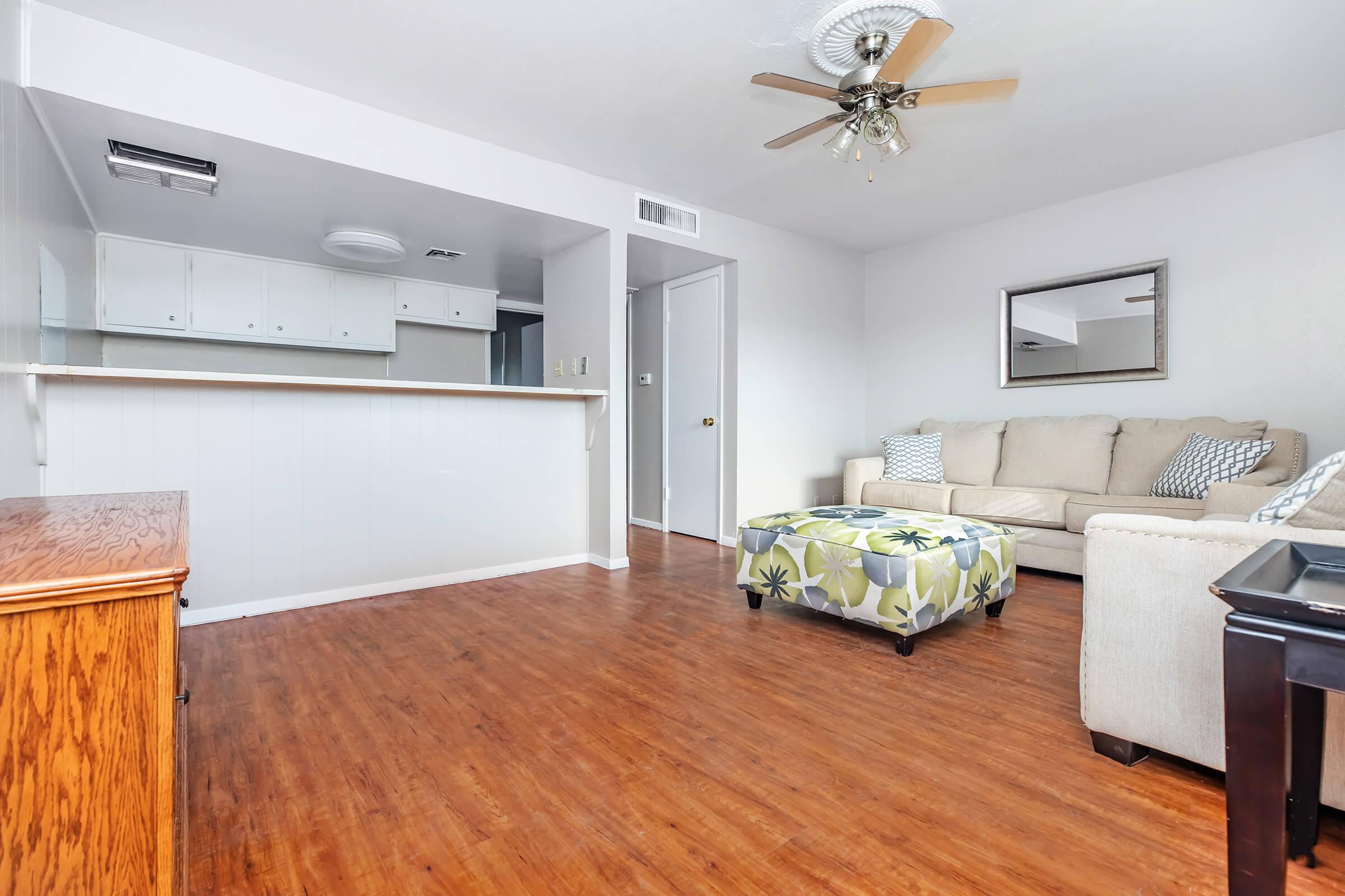 a living room with a wood floor