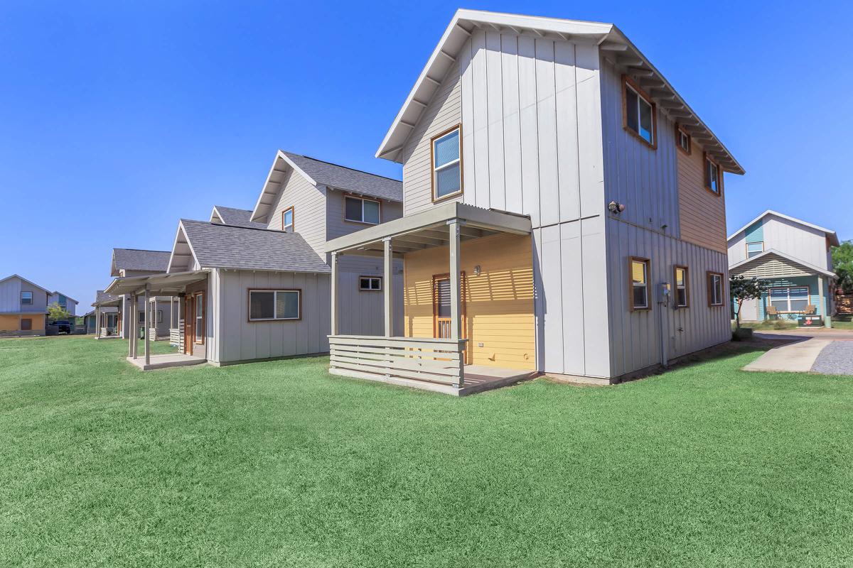 a large lawn in front of a house