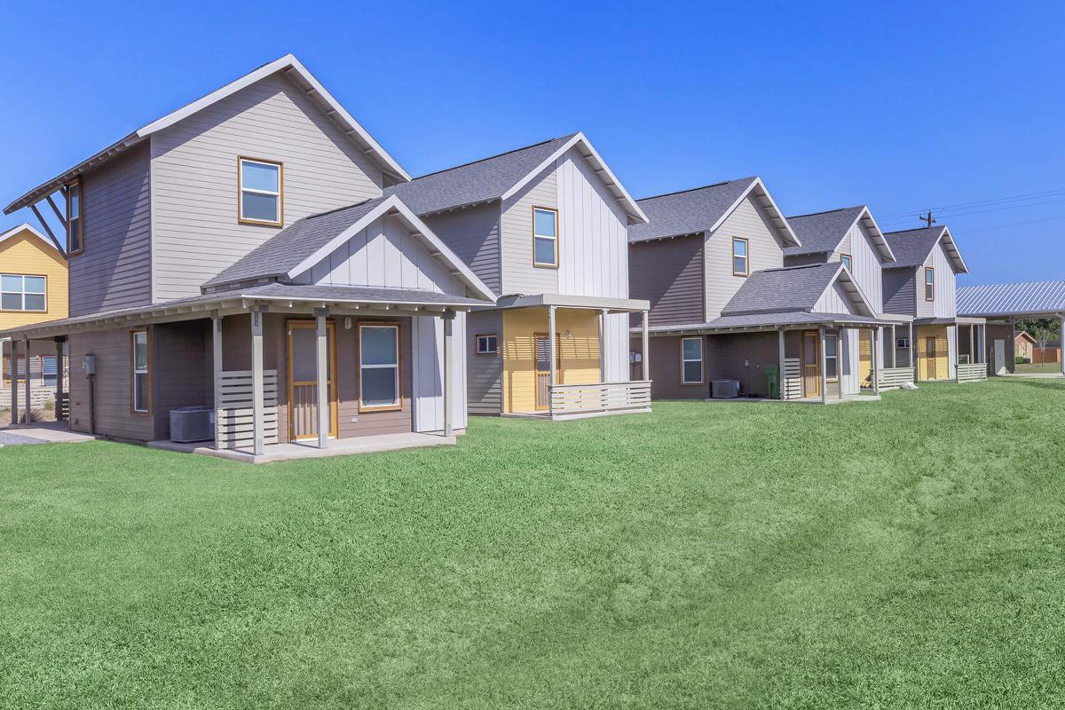 a large lawn in front of a house