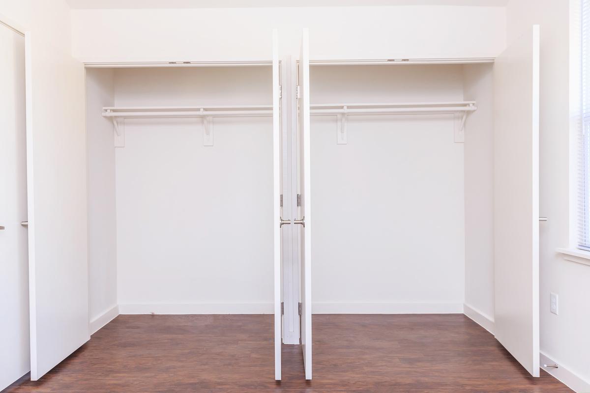 a large white refrigerator in a kitchen