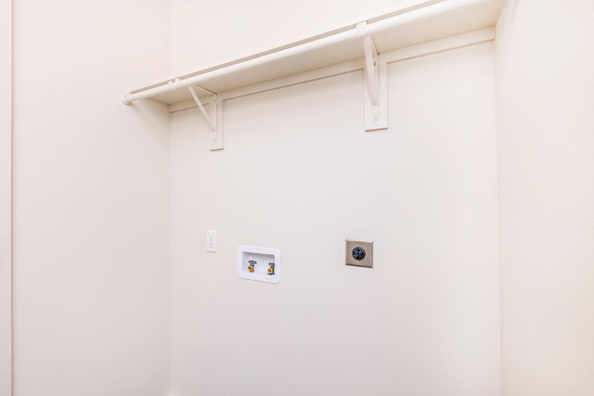 a white refrigerator freezer sitting in a room