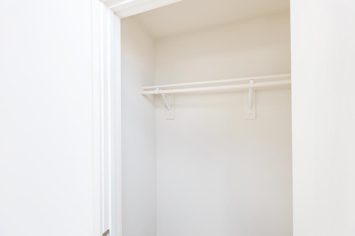 a white tub sitting next to a shower