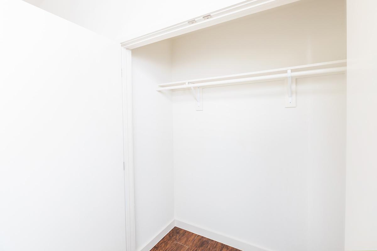 a white refrigerator freezer sitting in a room