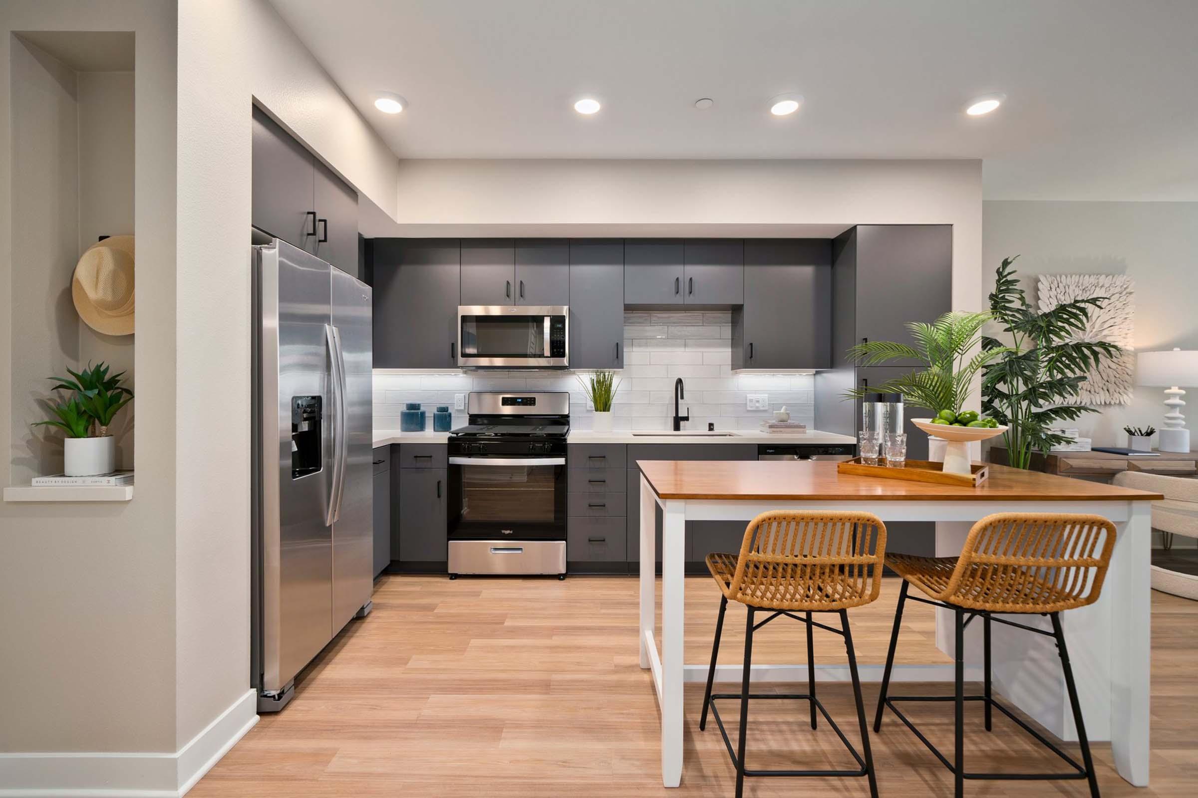 a kitchen with a wood floor