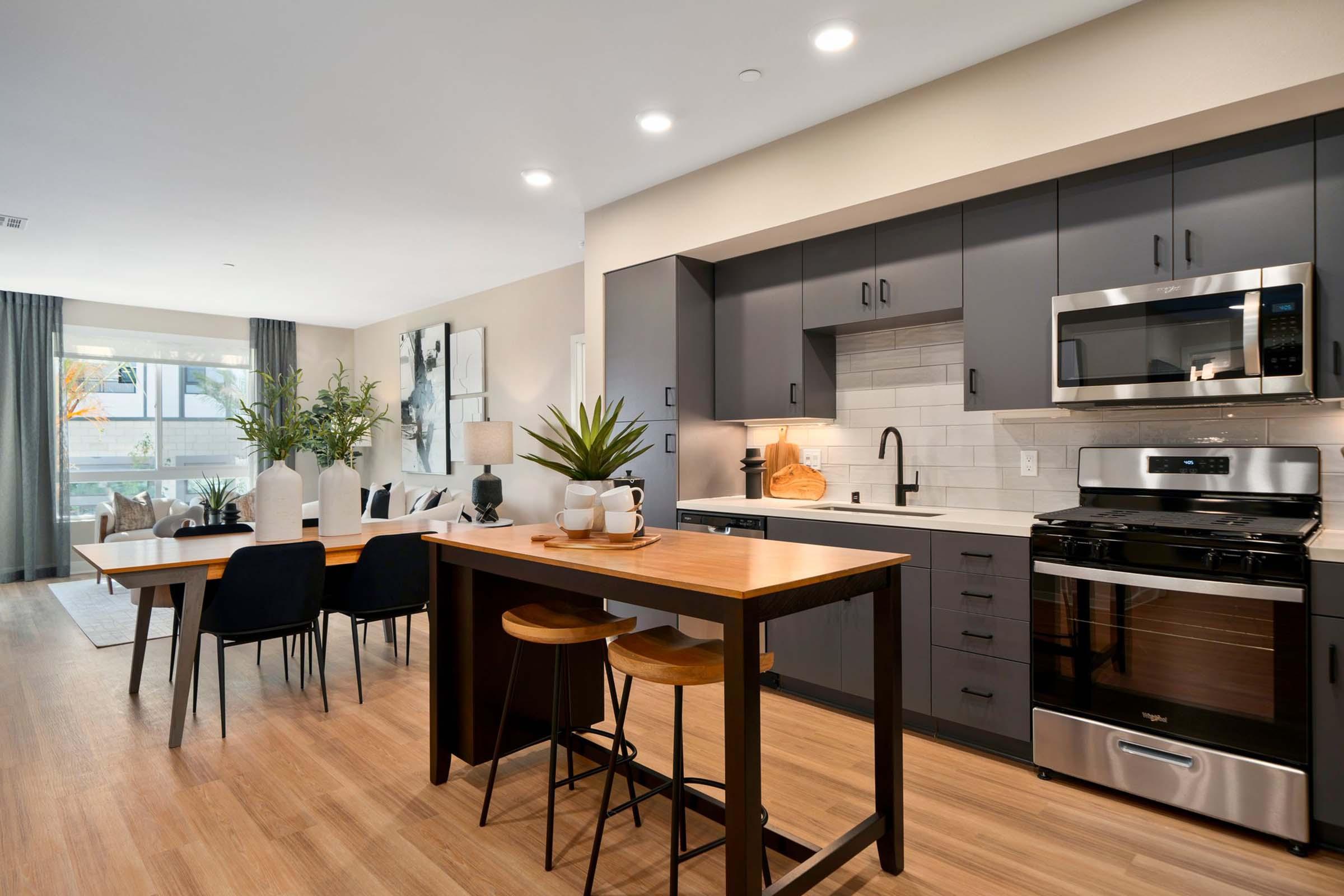 a kitchen with a dining room table