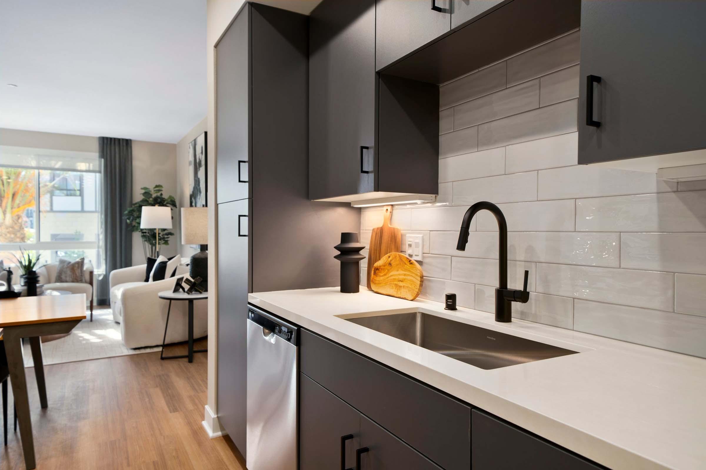 a kitchen with a sink and a window