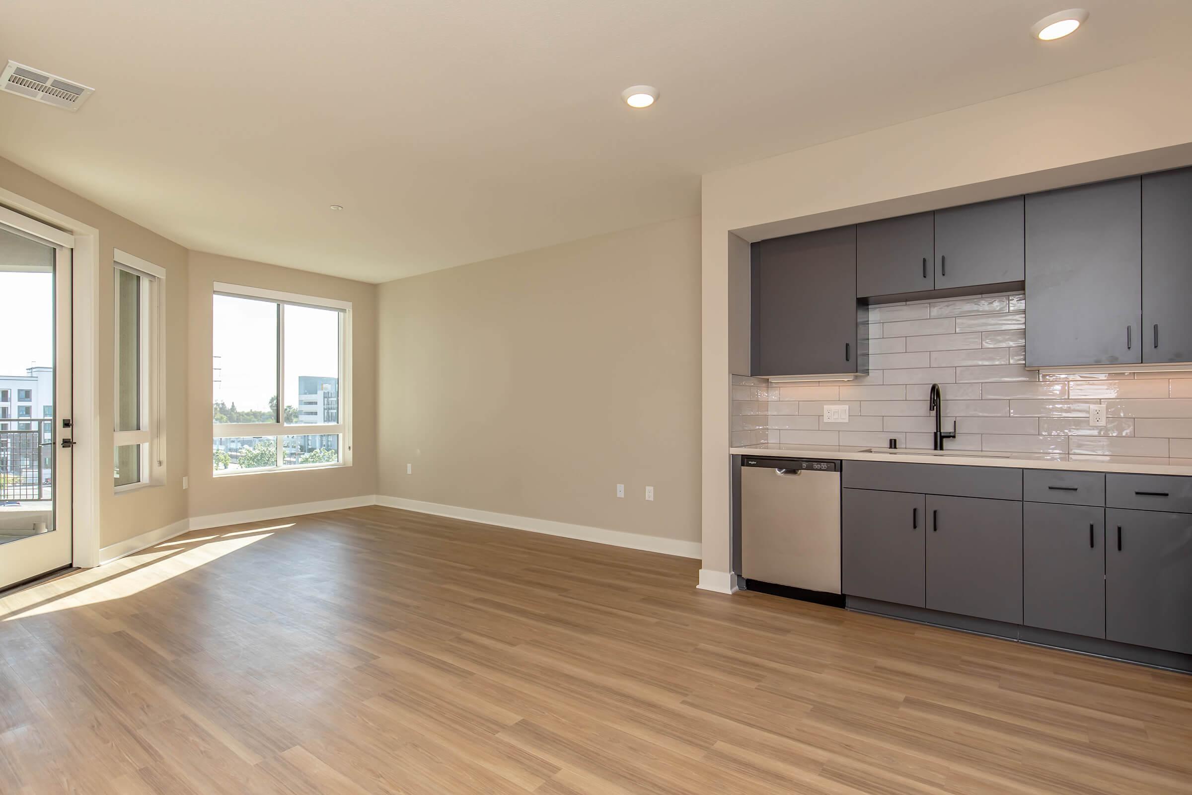 a room filled with furniture and a large window