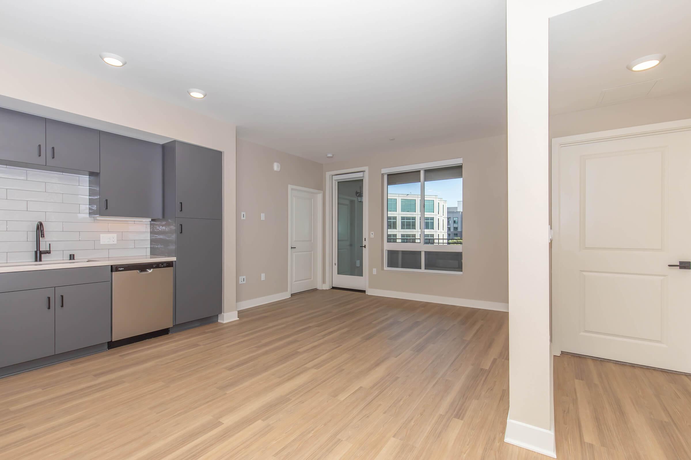 a kitchen with a wood floor