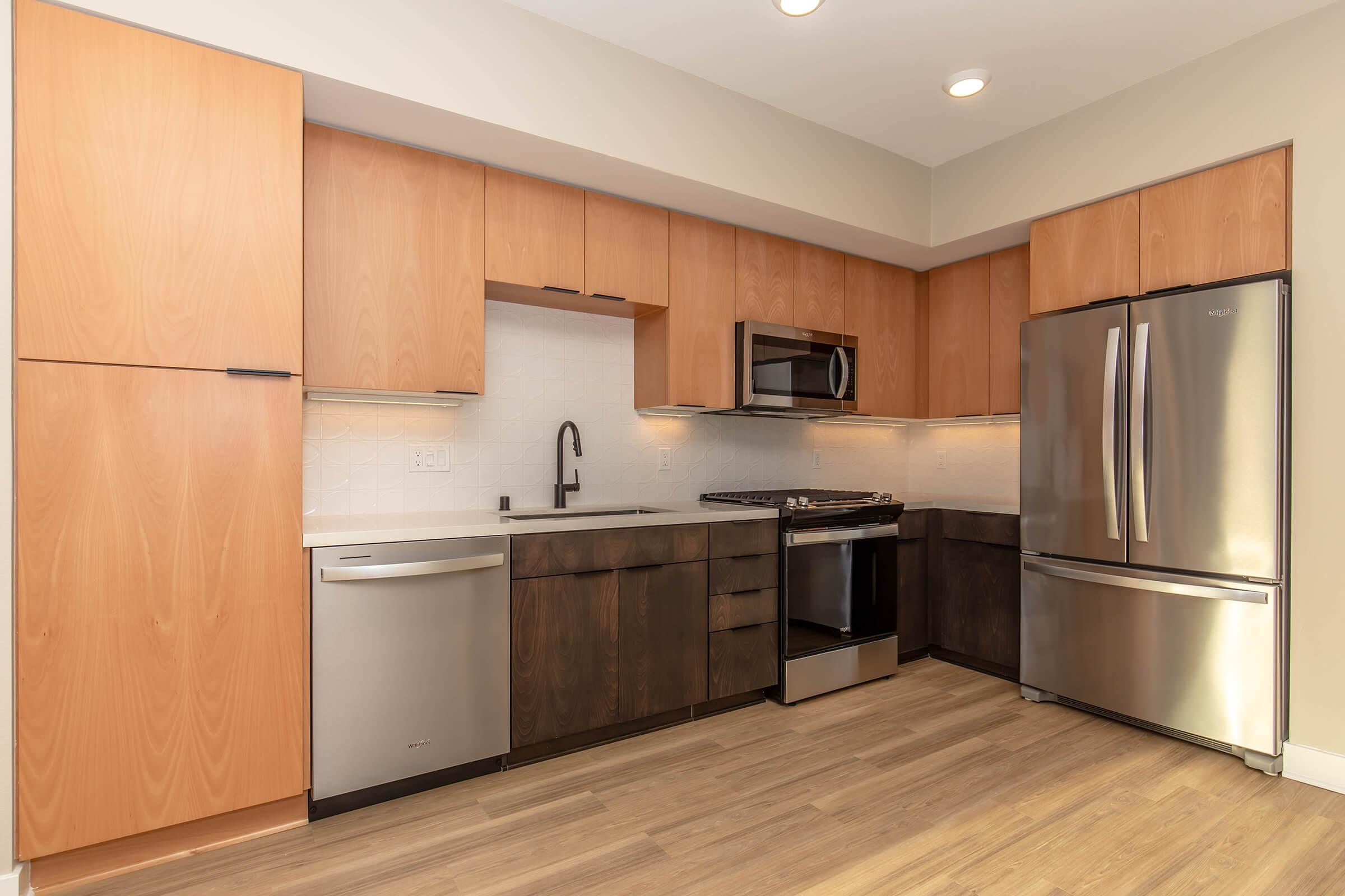 a stainless steel refrigerator in a kitchen